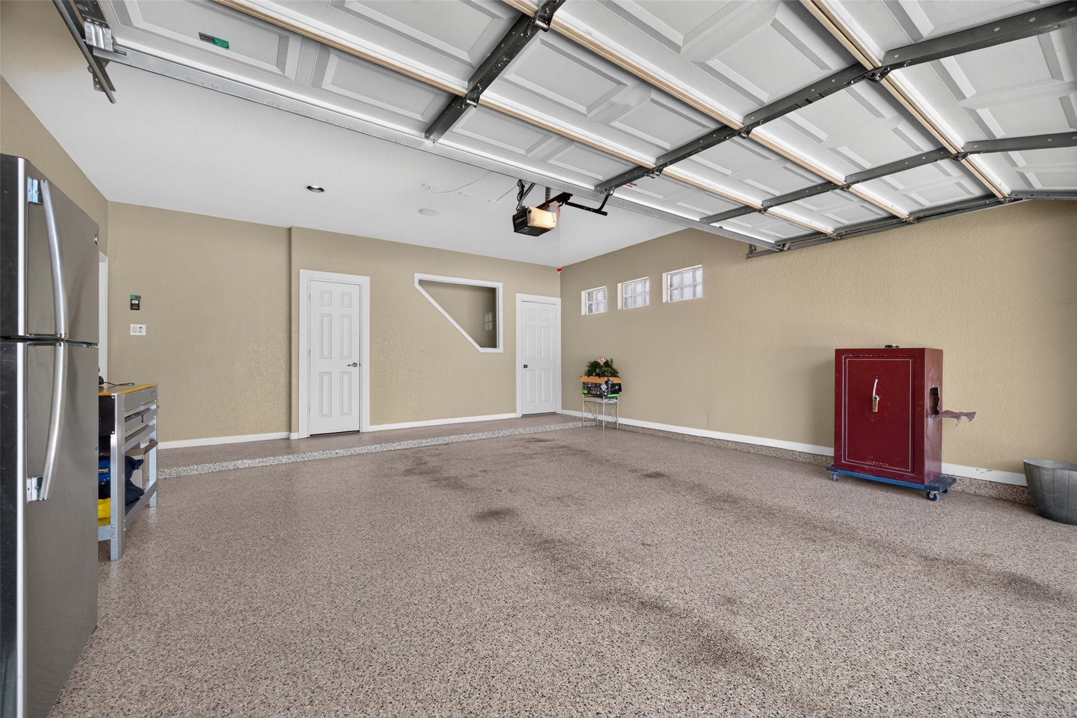 Garage with stairs to attic