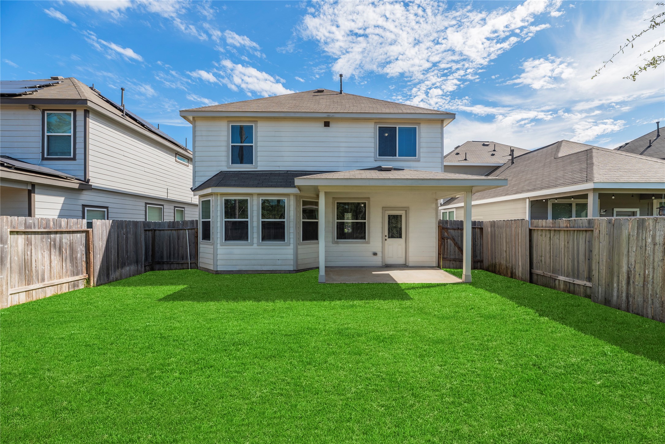 Fenced backyard, perfect for playground, garden or entertaining.