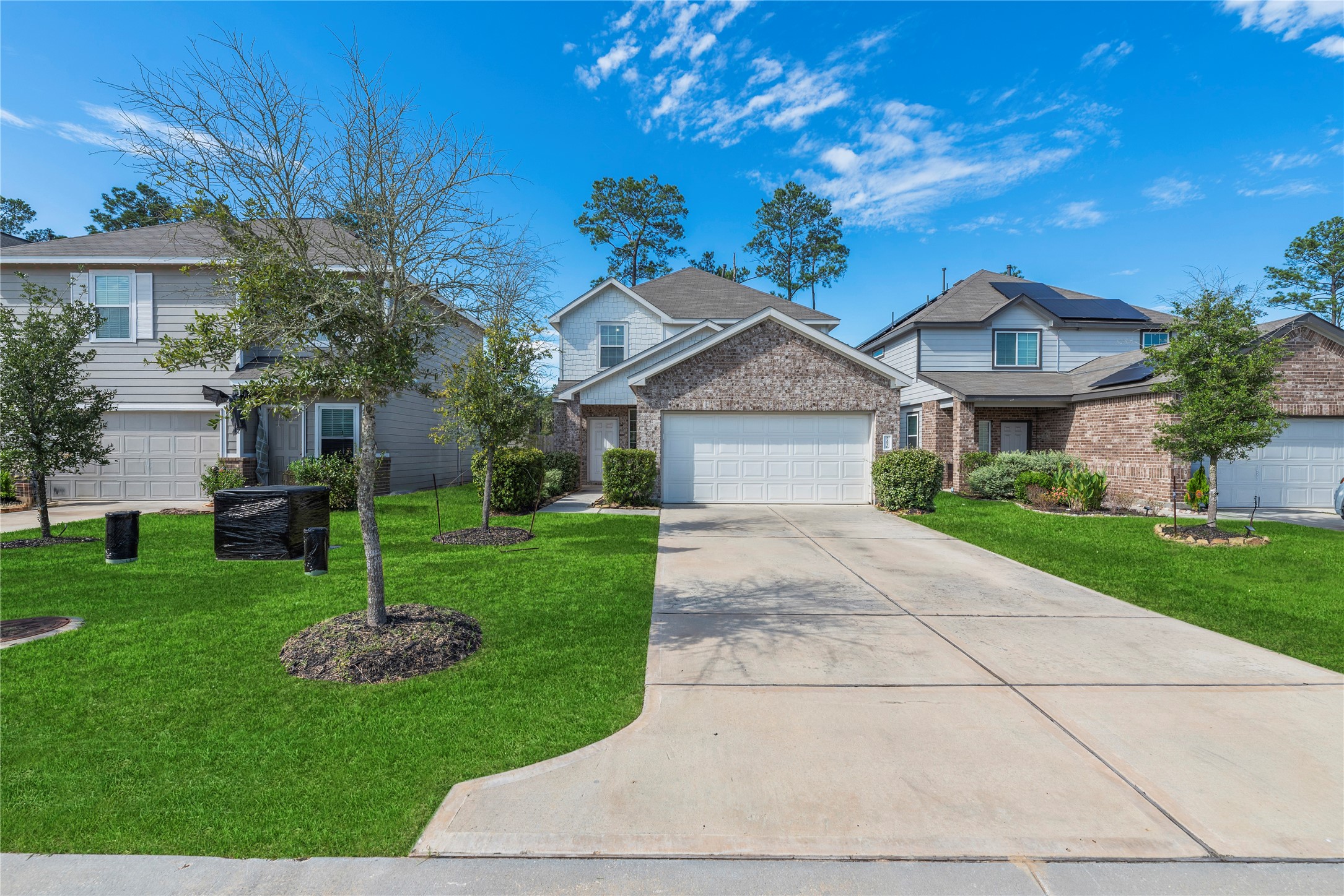 Inviting front elevation and landscaped approach