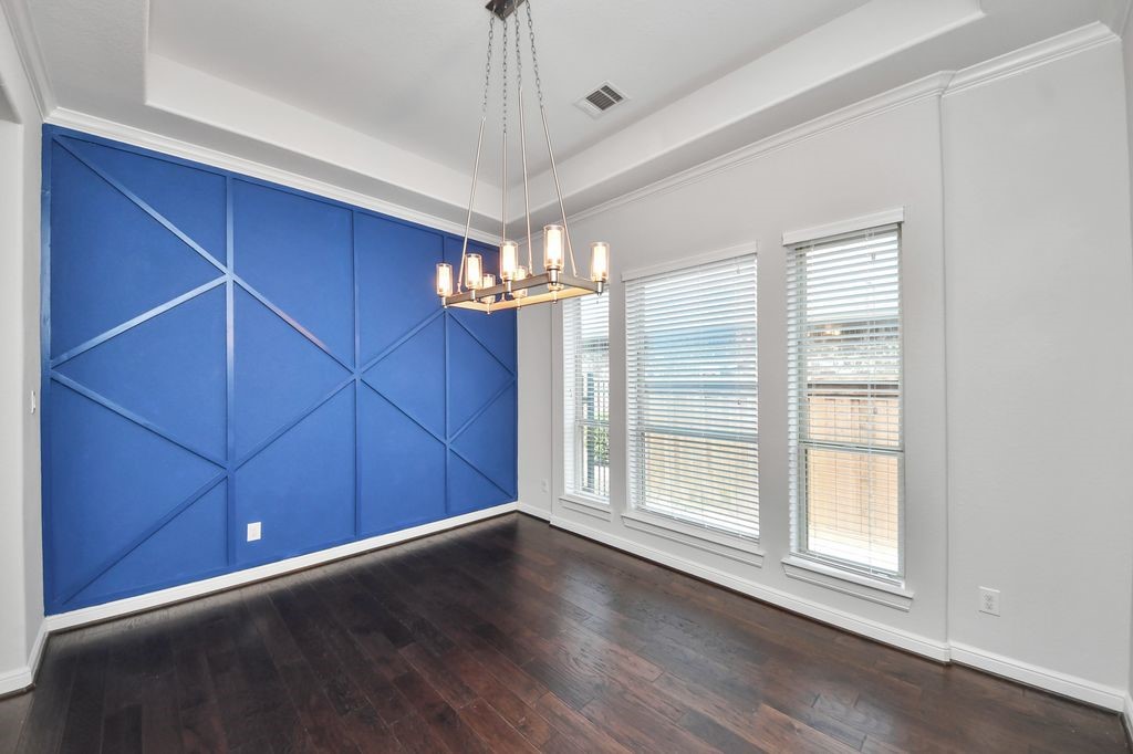 Tray ceiling & access to the butler's pantry make this a much-loved dining room!