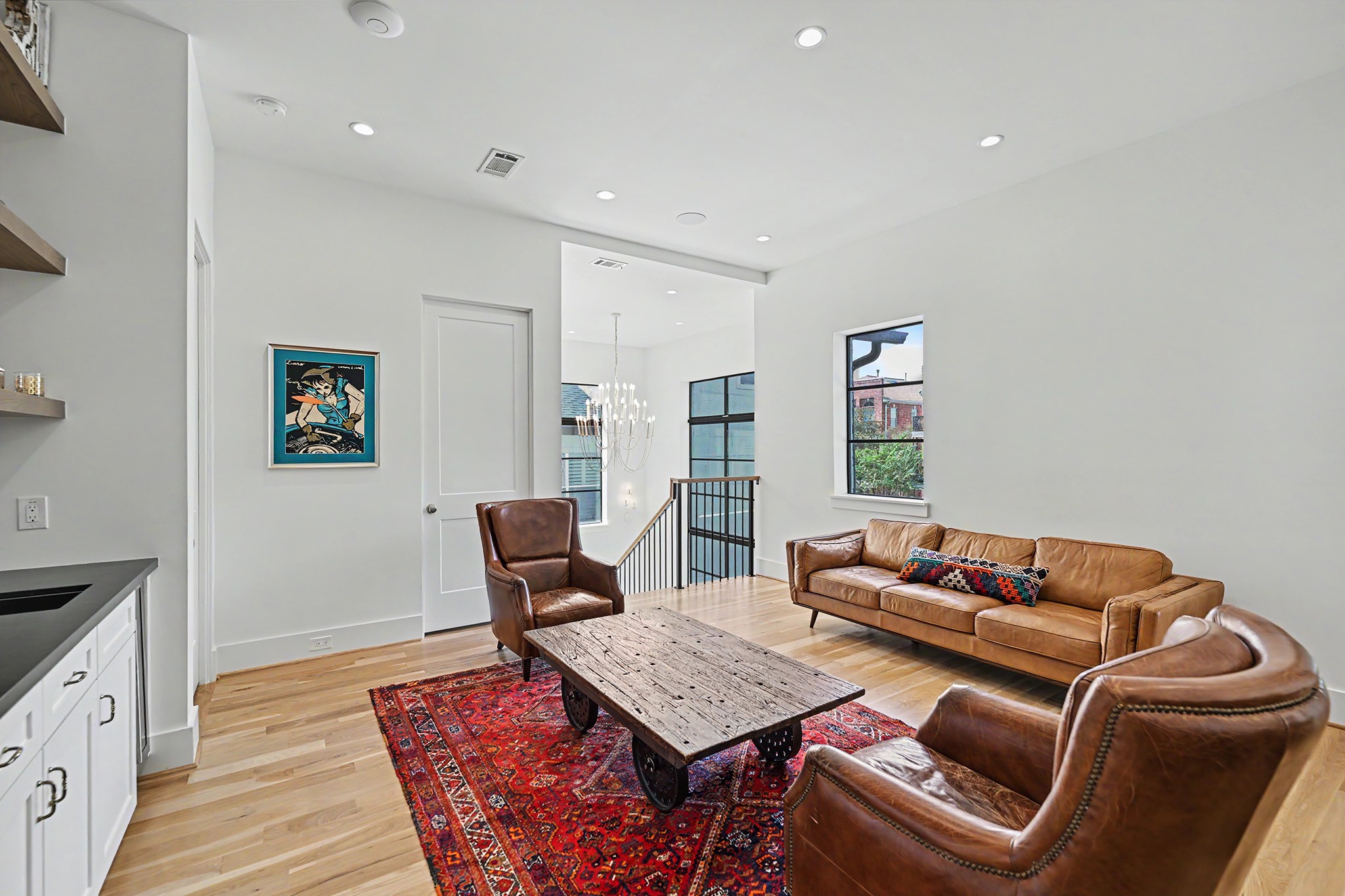 The spacious upstairs game room provides a comfortable setting for relaxing, gathering or entertaining.