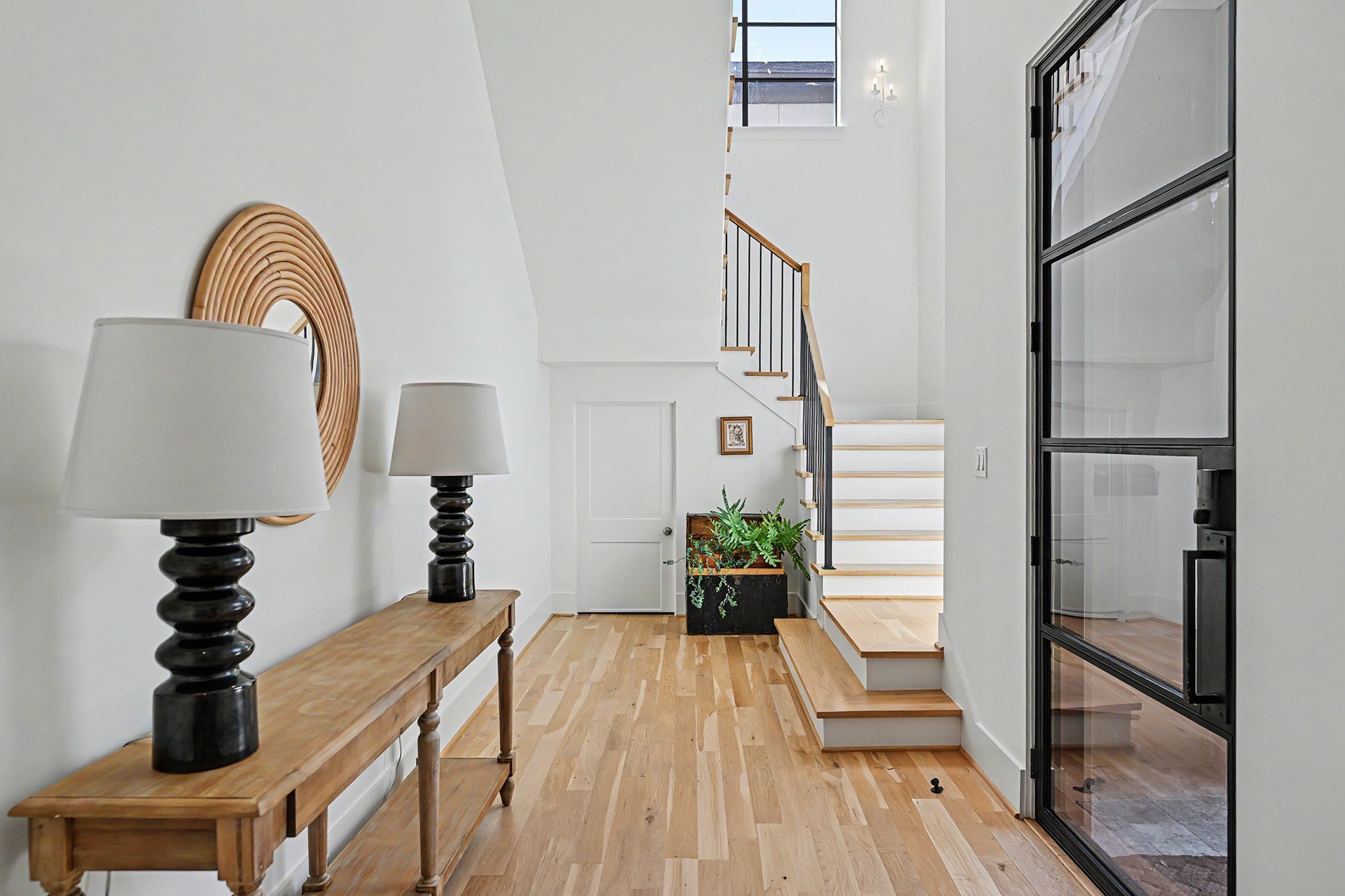 Formal entry with incredible storage underneath the stairs.