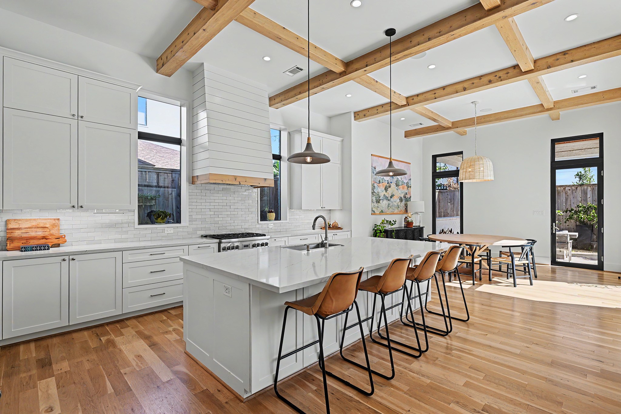 A substantial center island offers abundant preparation space and comfortable counter seating.