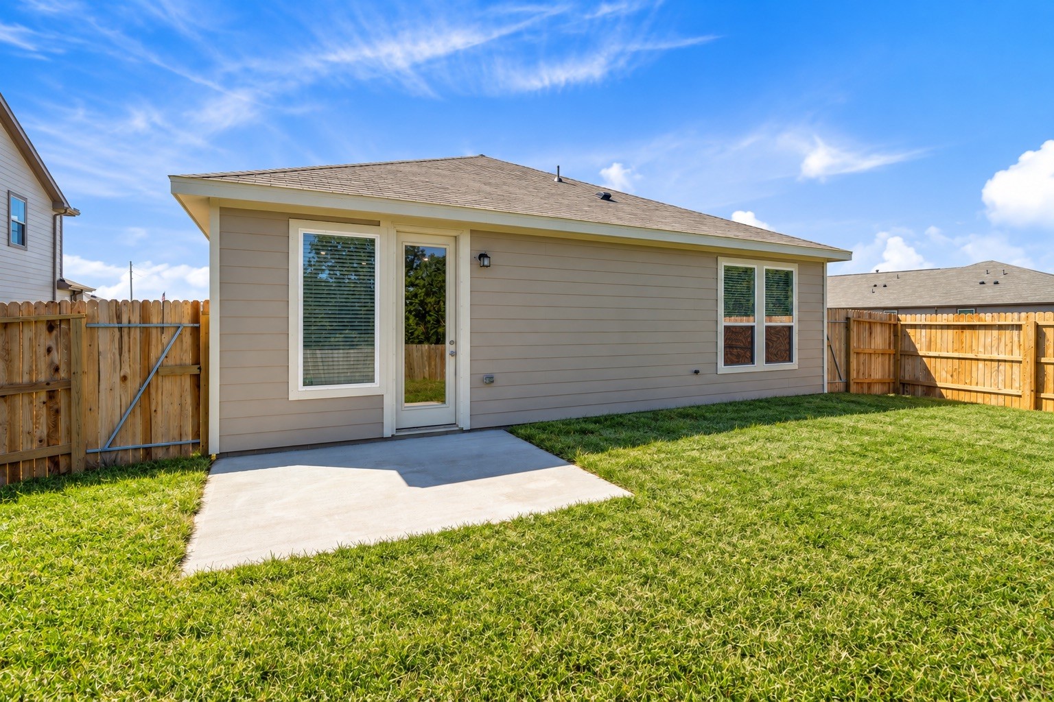 Come explore this generous backyard with large patio slabperfect for kids to play freely and adults to unwind in comfort!