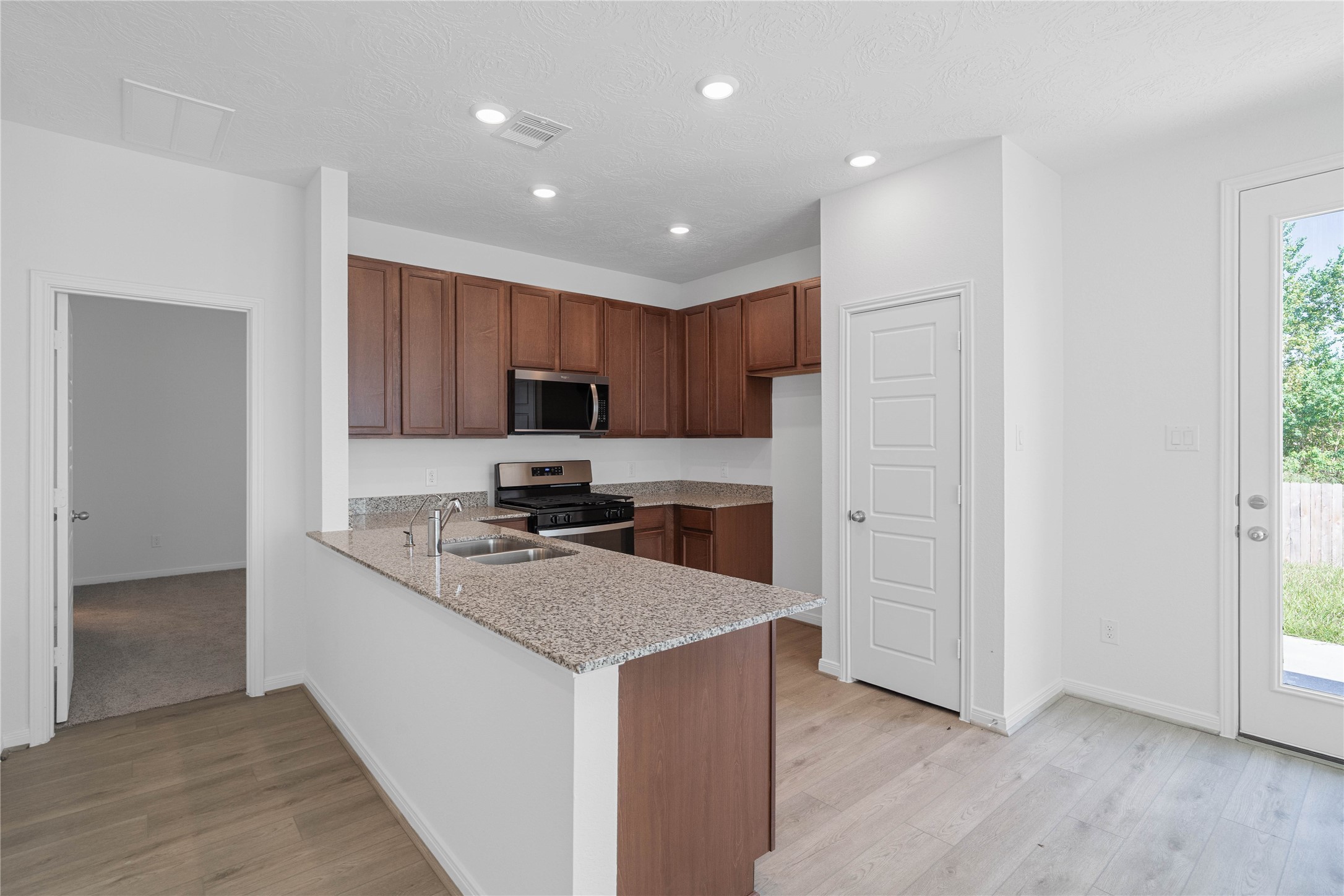 This spacious kitchen has it allample storage, generous counter space, and a layout that truly makes it the heart of the home.