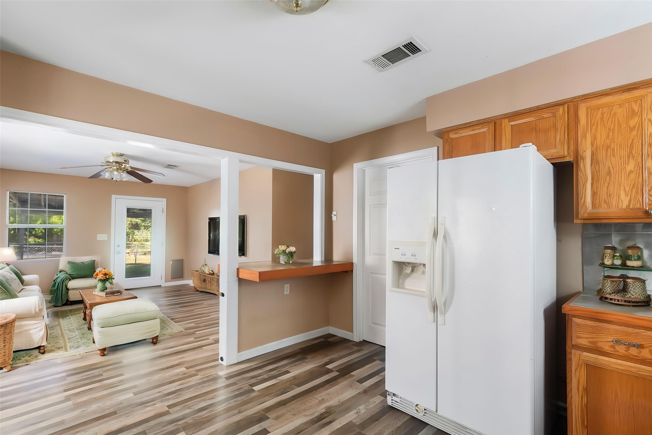 Breakfast bar offers a casual dining or serving area. (This photo is virtually staged.)