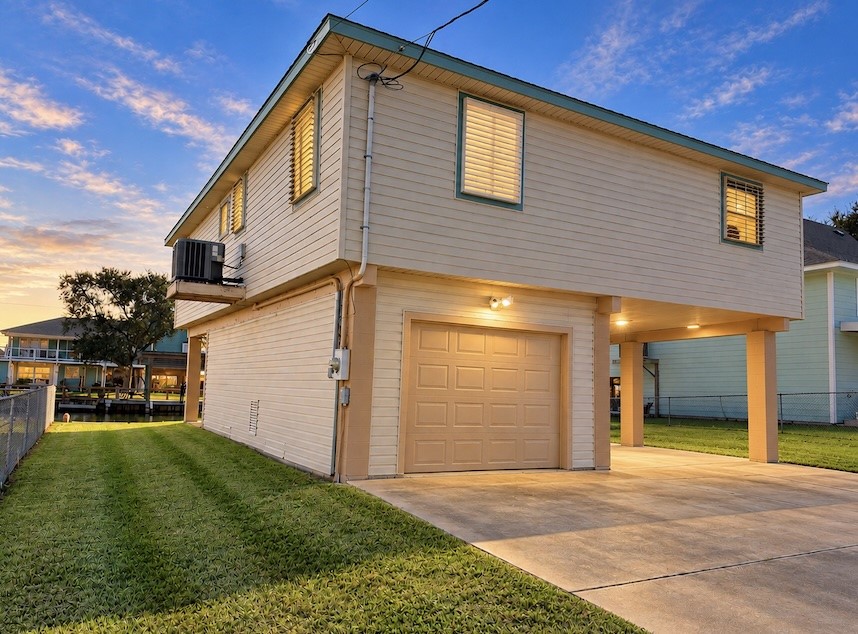 Welcome to 257 Barracuda St offering a tandem garage and breezeway.