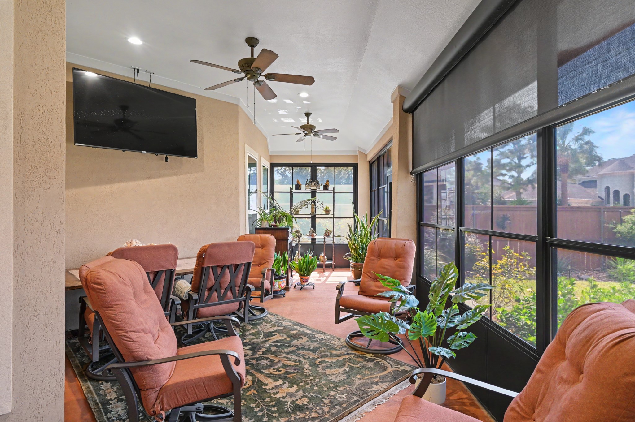 Exceptional enclosed outdoor living space perfect for entertaining or unwinding.