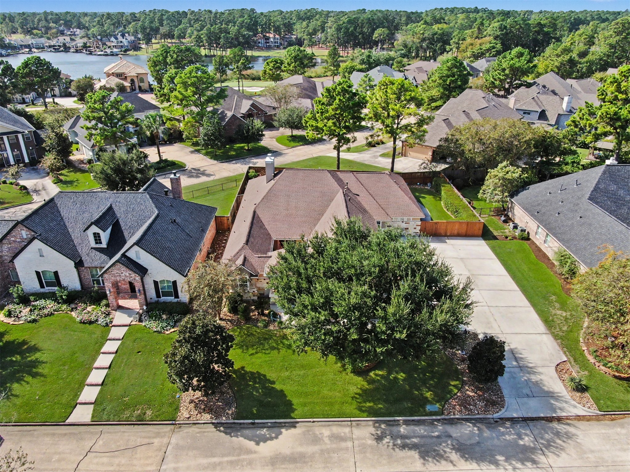 Beautiful aerial view showcasing the home's desirable setting and established neighborhood.
