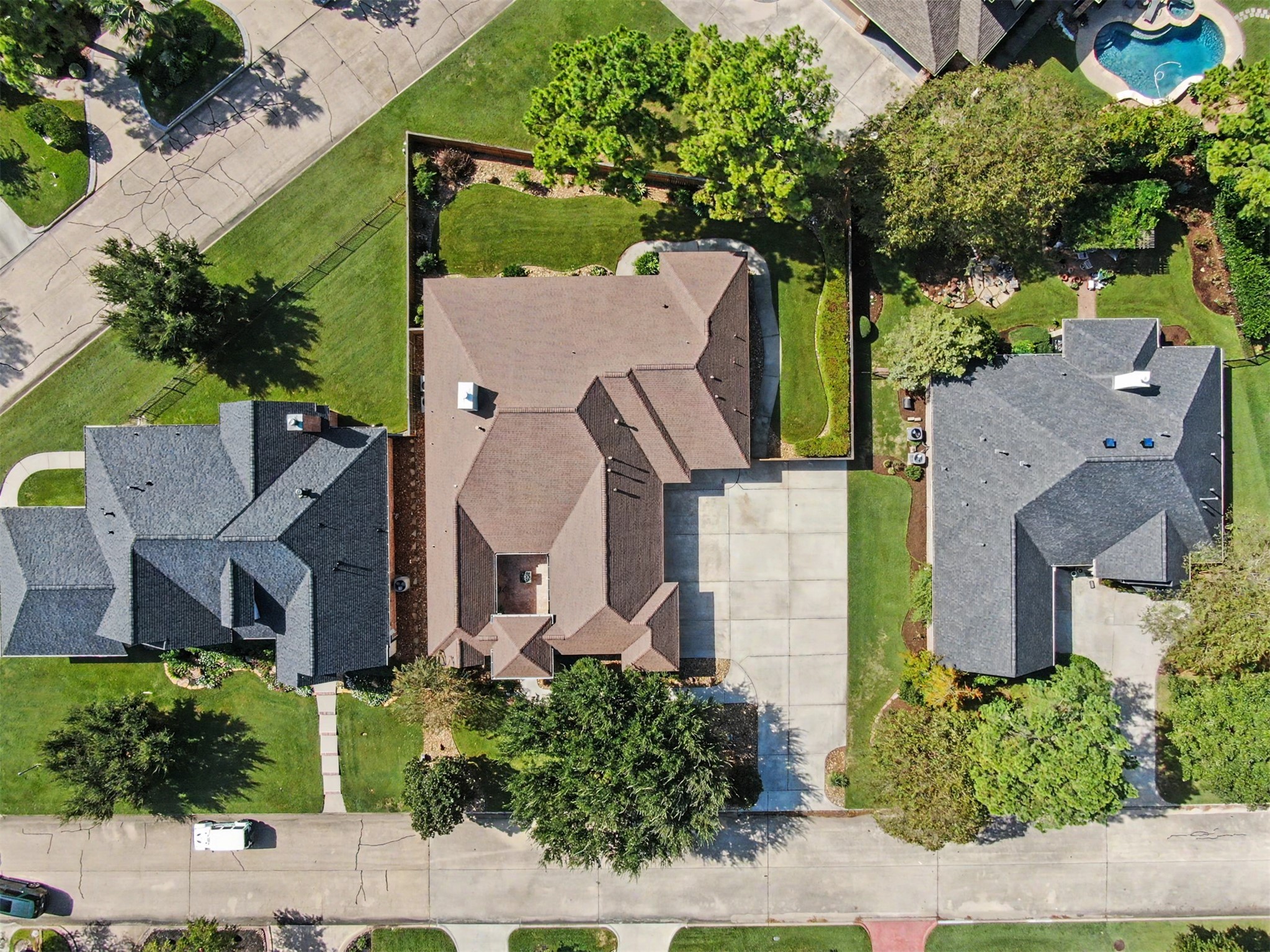 Bird's-eye view highlighting the home's attractive footprint and generous outdoor spaces.