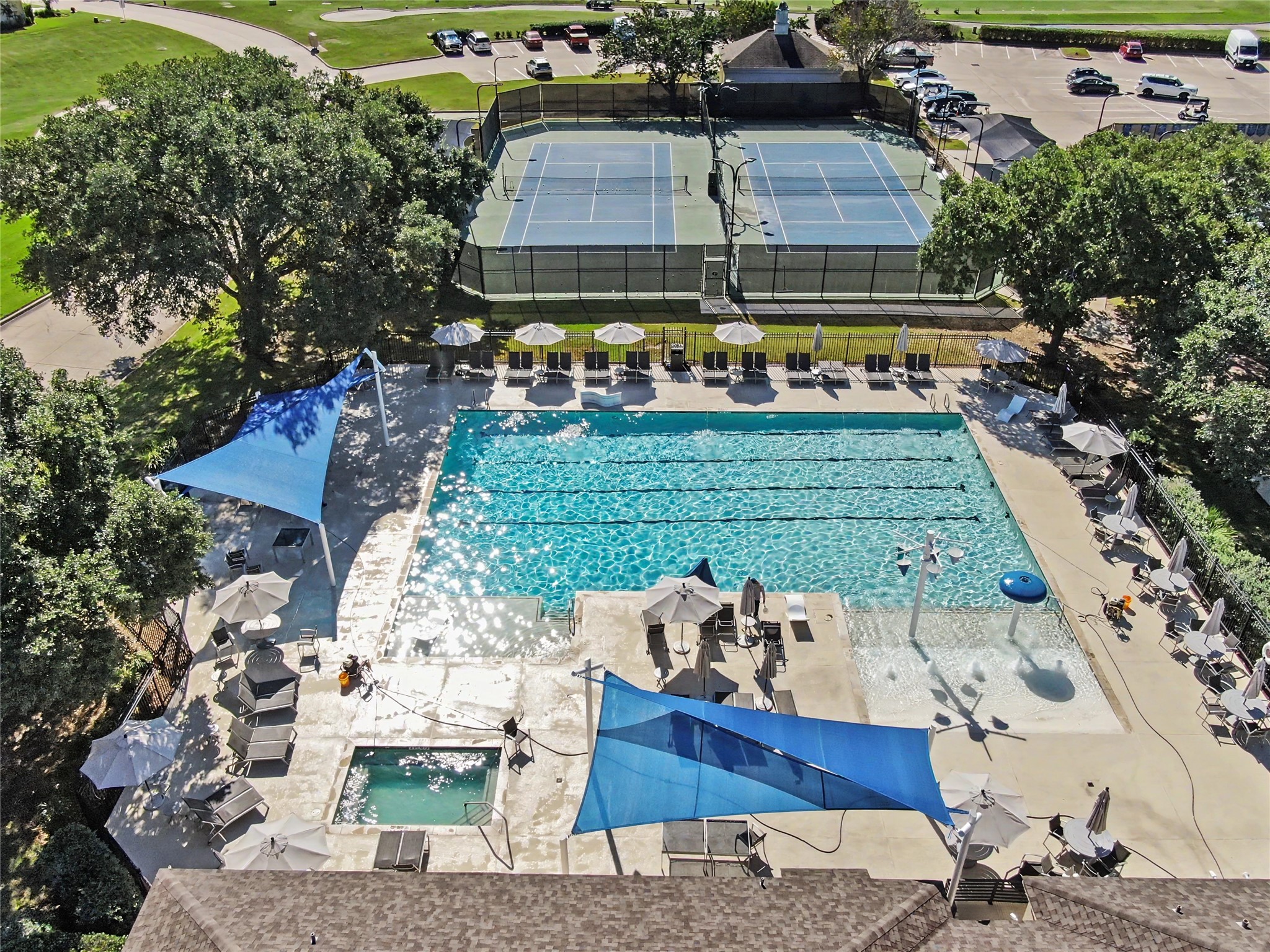 Resort-style swimming pool with inviting lounging and relaxation areas.