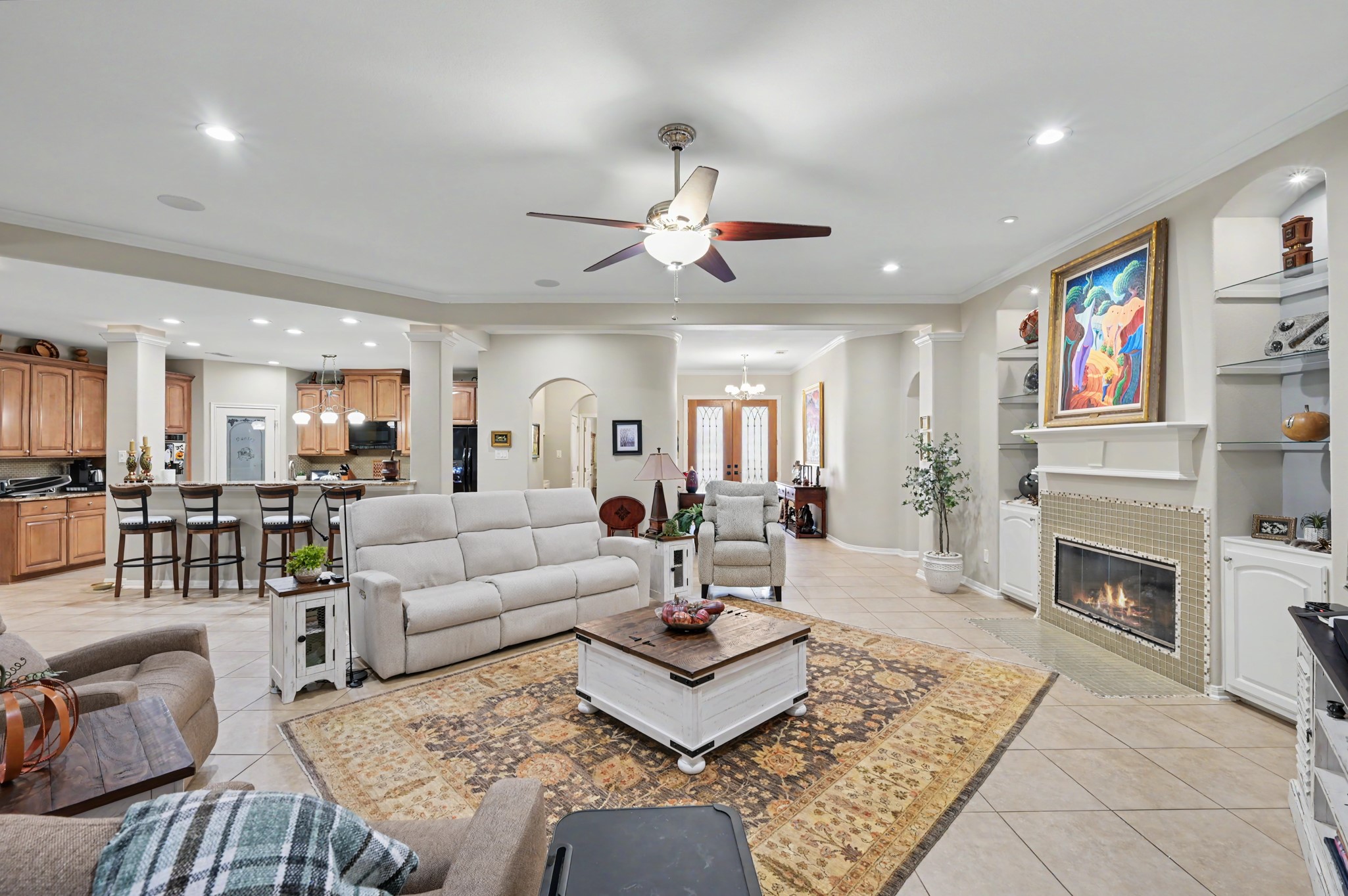 Warm and welcoming living area seamlessly connected to the spacious kitchen.