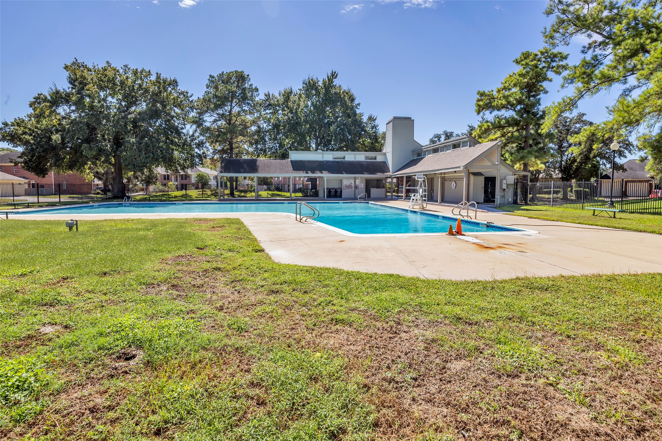 Cool off at the community pool on hot Houston days.