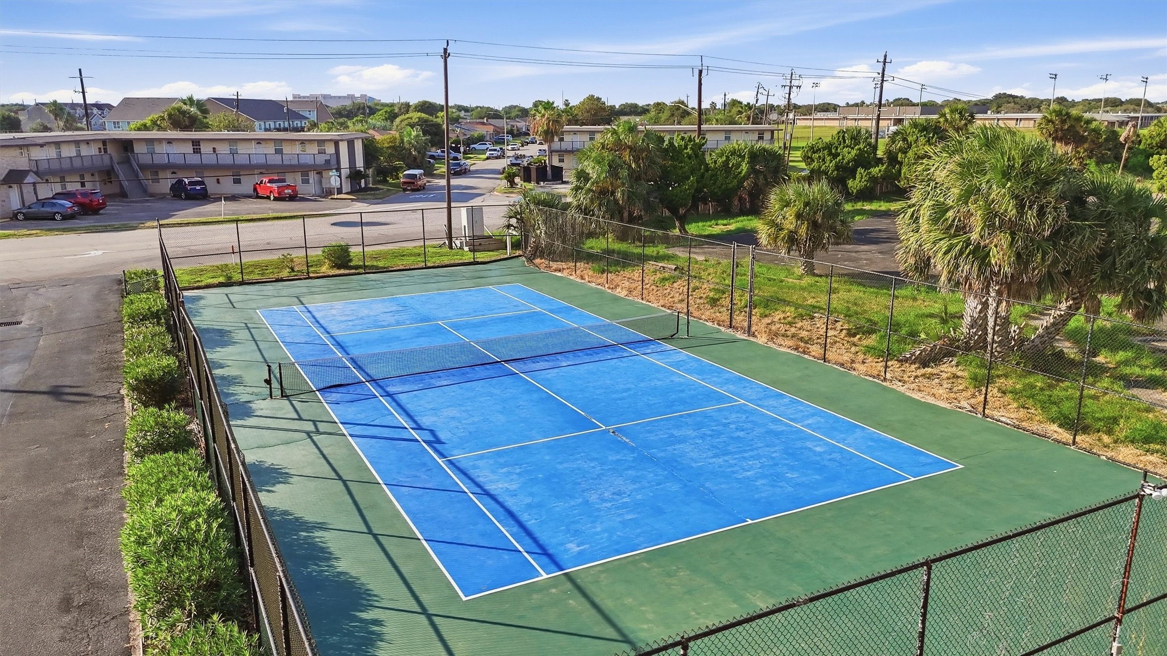 Enjoy access to a well-maintained tennis court, perfect for active living in a community setting.