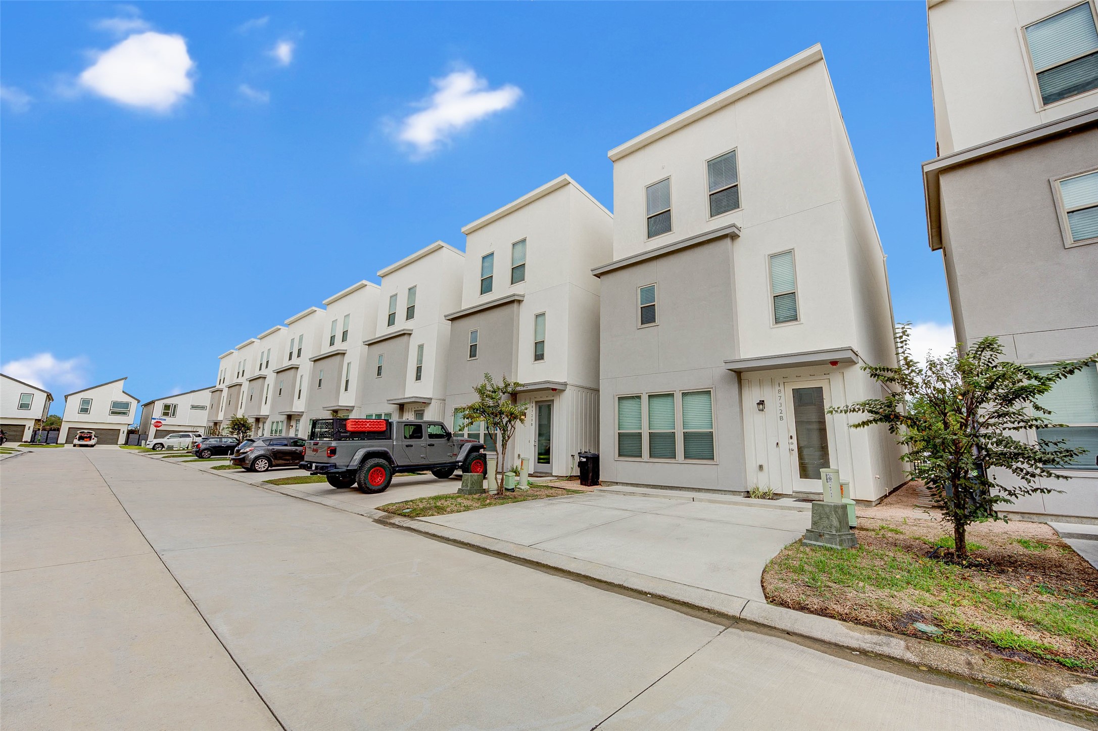Discover modern living in this sleek townhouse featuring a convenient 2-car driveway, perfect for effortless urban lifestyle.