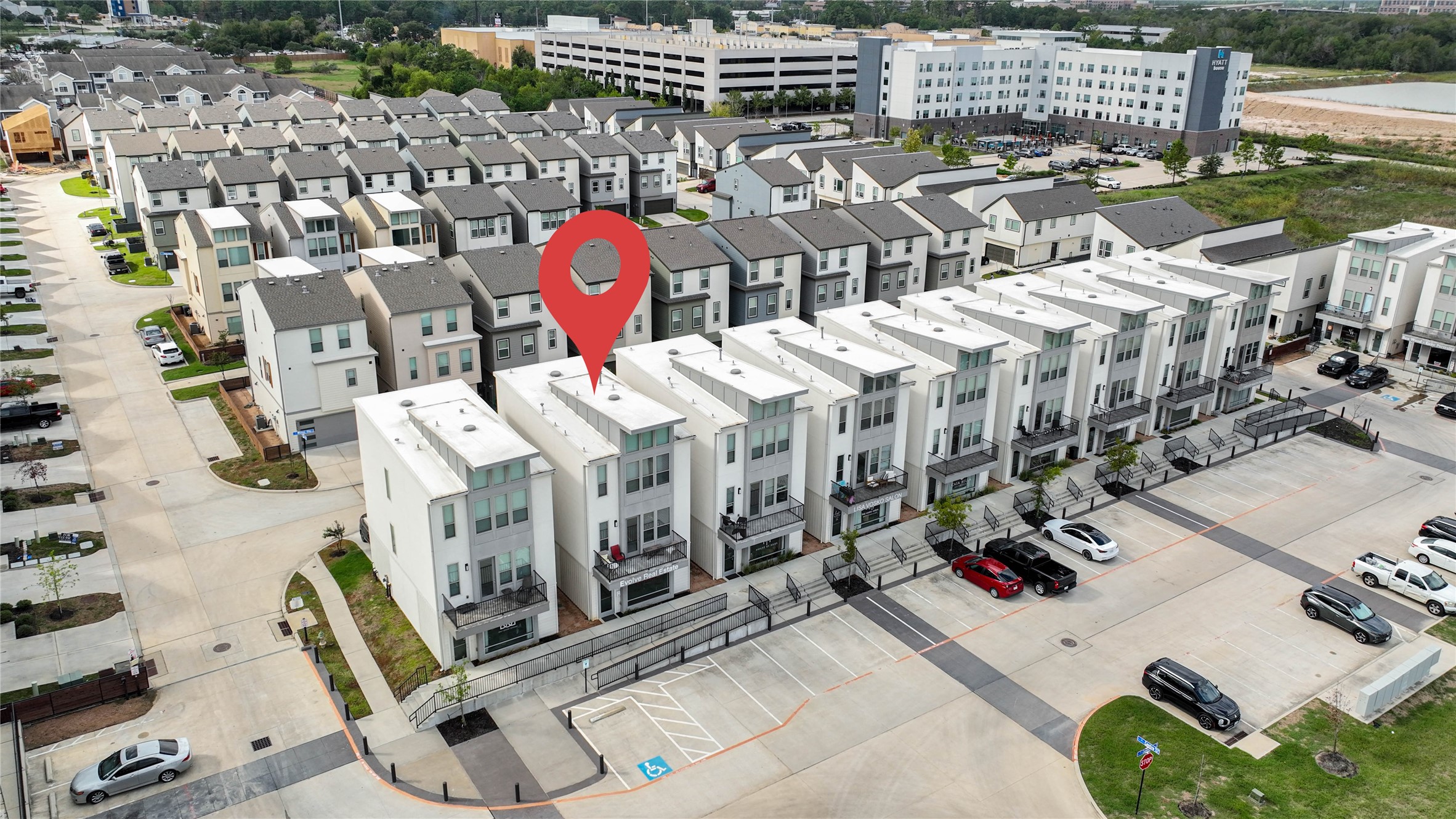 Modern townhouse in a well-maintained community, featuring contemporary architecture, ample parking, and convenient access to nearby amenities. Ideal for those seeking a stylish and comfortable living space.
