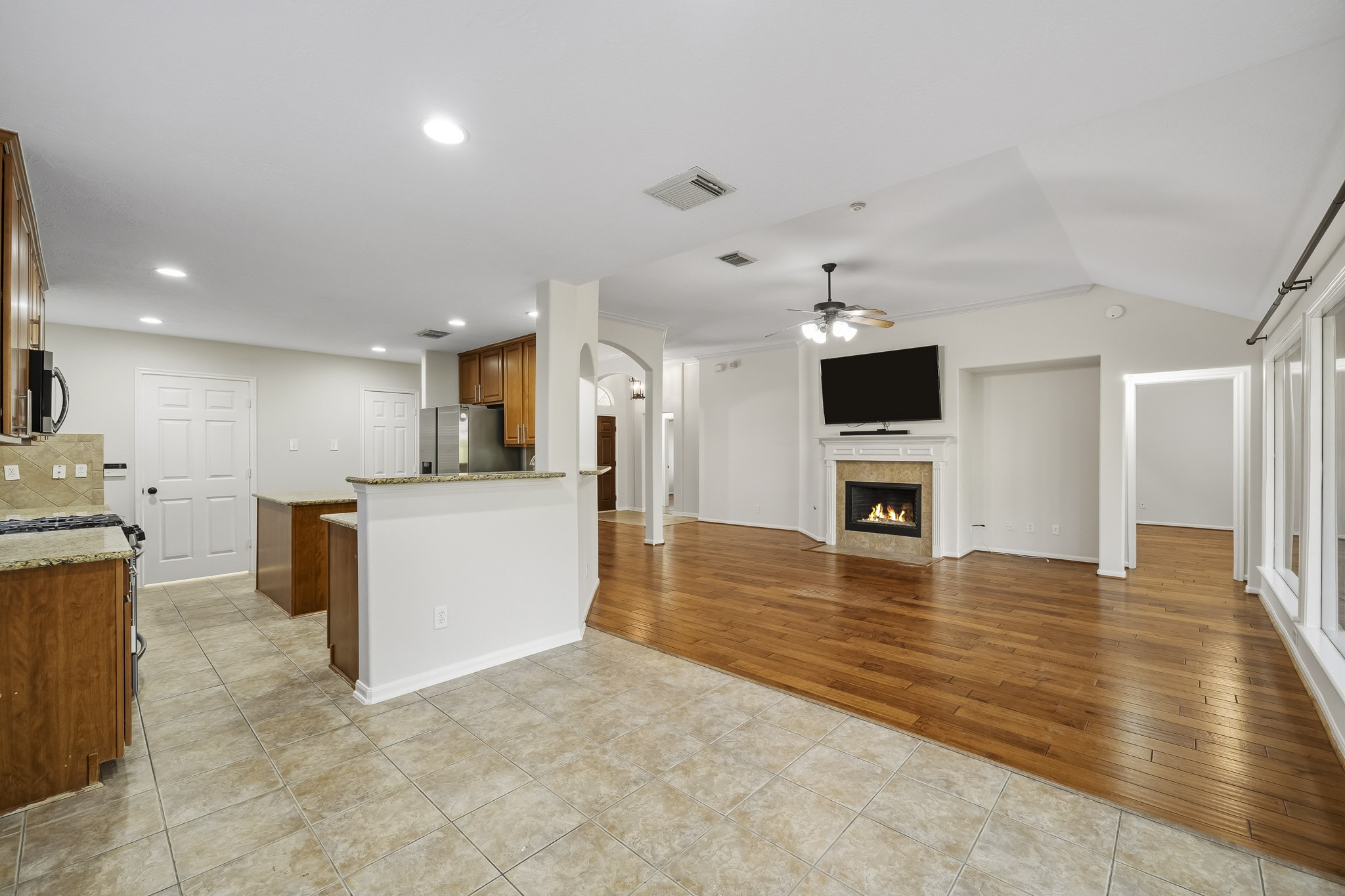 Kitchen seamlessly flows into the spacious family room, making it an entertainer's dream and perfect for the home chef to stay connected while cooking.