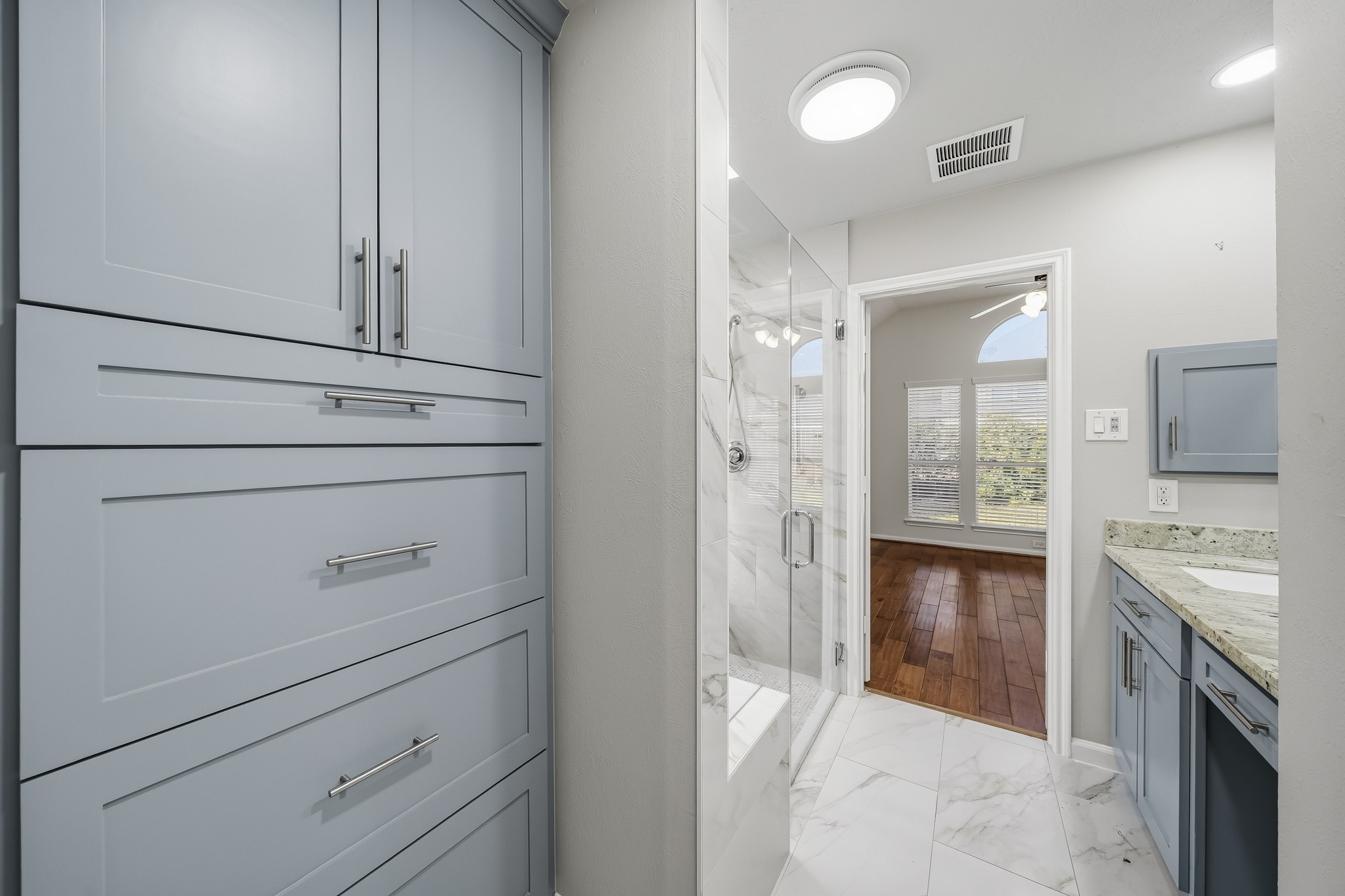 Experience true relaxation in this spa-inspired primary bathroom, meticulously designed to blend high-end luxury with everyday functionality.