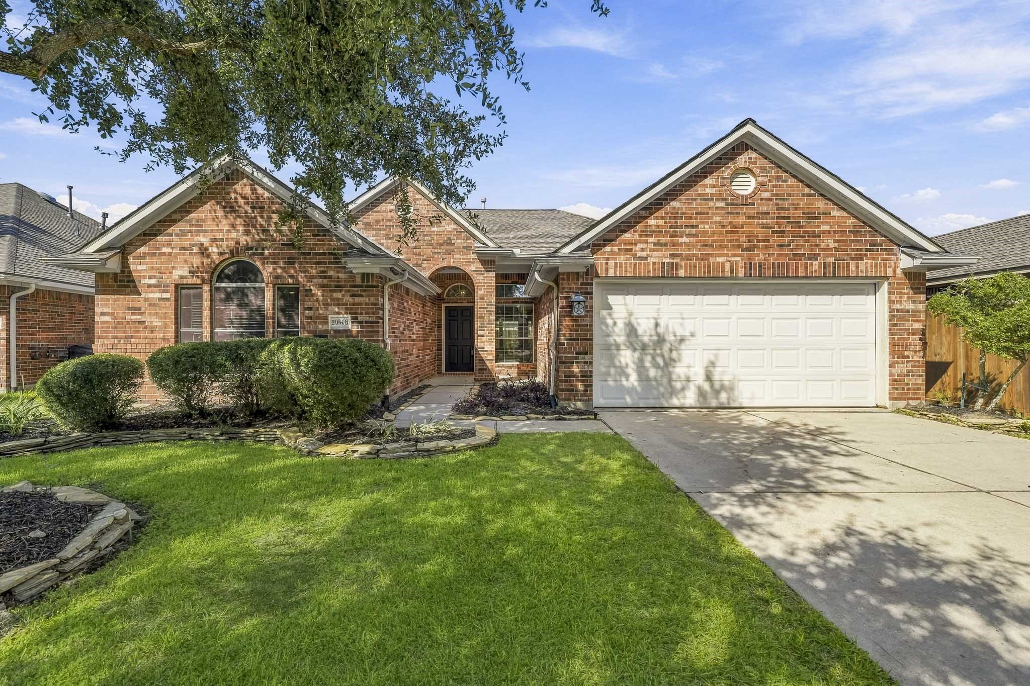 This charming residence offers a perfect blend of classic curb appeal and inviting character, providing a warm and inviting atmosphere from the moment you arrive.