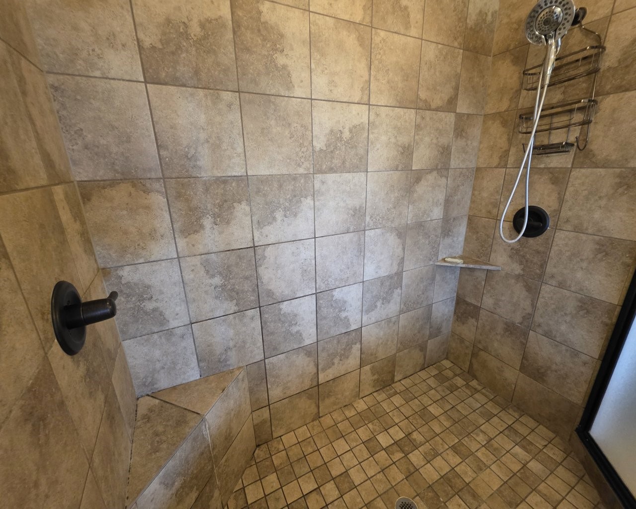 Beautiful shower with a bench