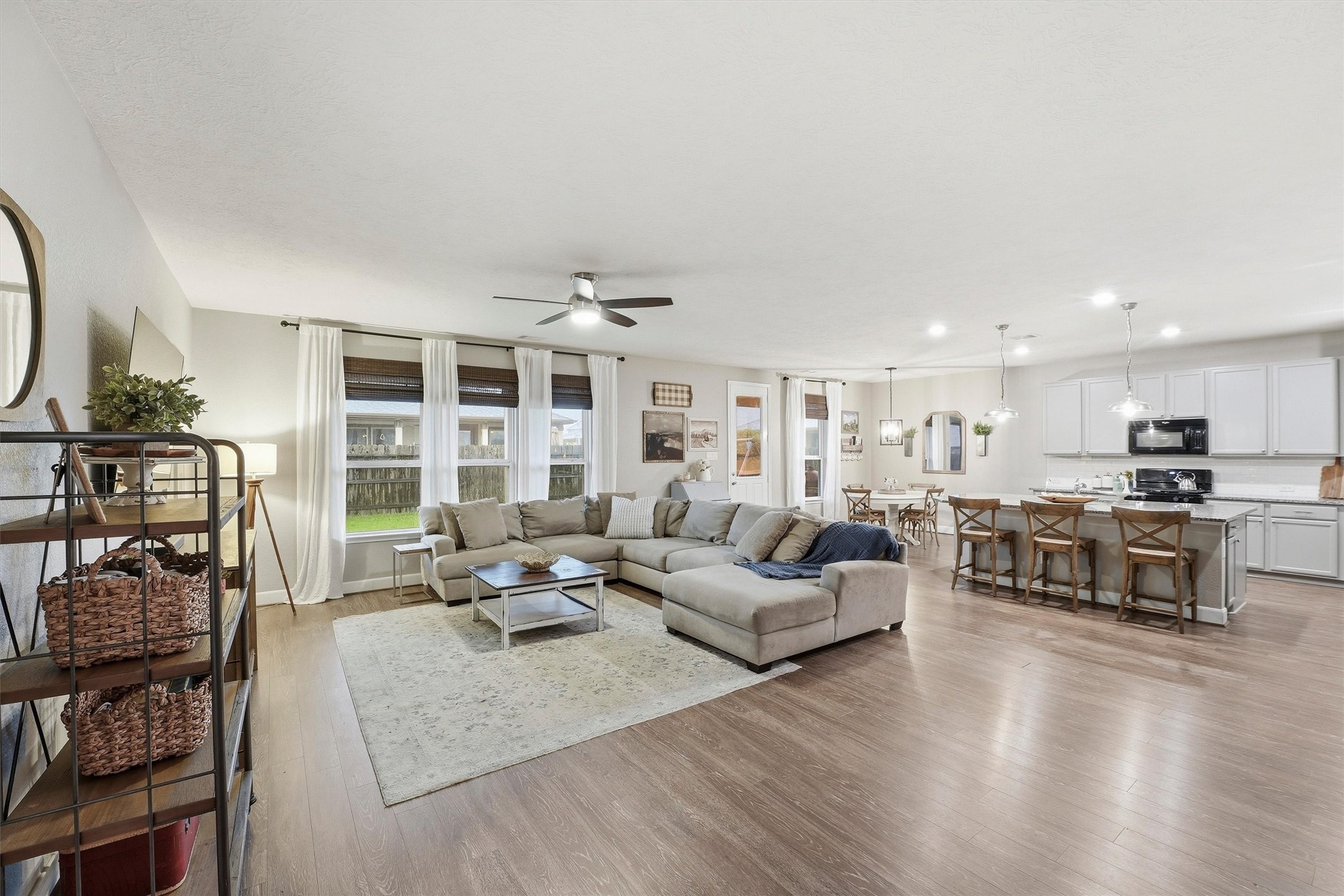The heart of the home- an inviting layout that keeps everyone connected from the kitchen to the living area.