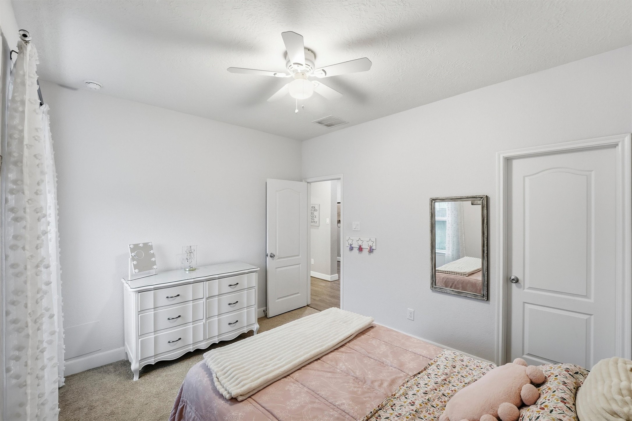 Another view of this secondary bedroom with walk-in closet.