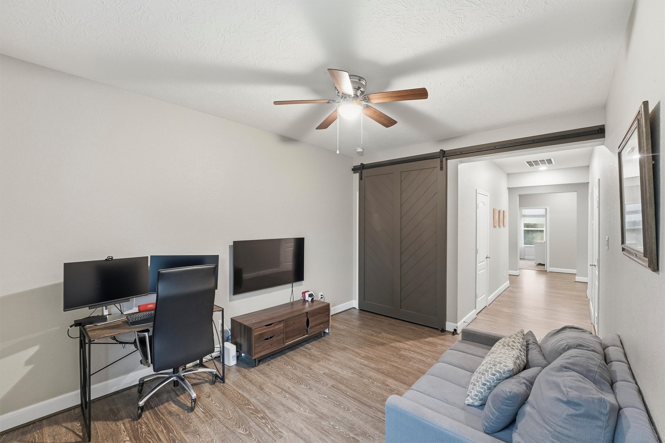 View into the fourth bedroom from the main entry.