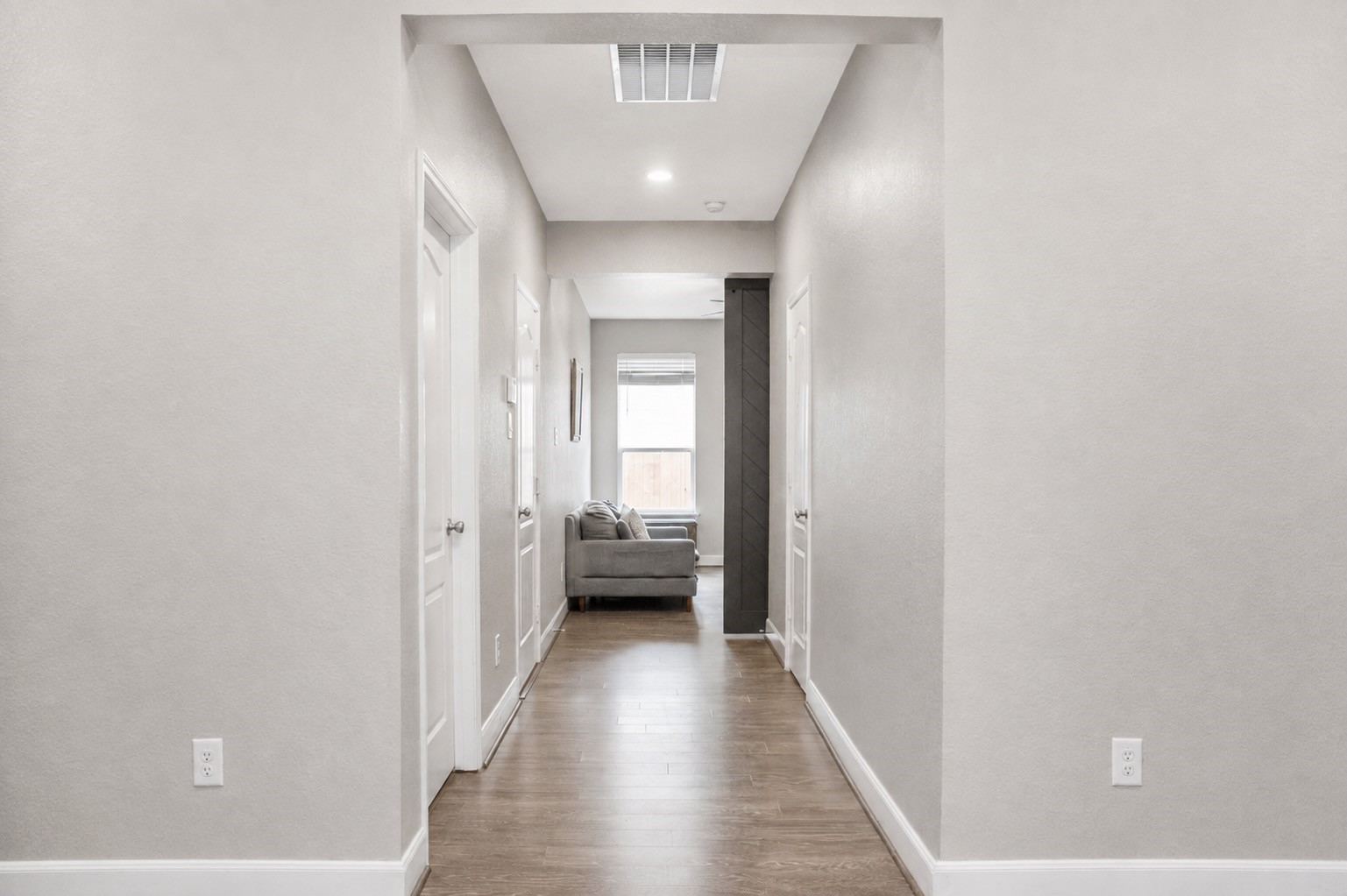 View into the fourth bedroom from the main entry.