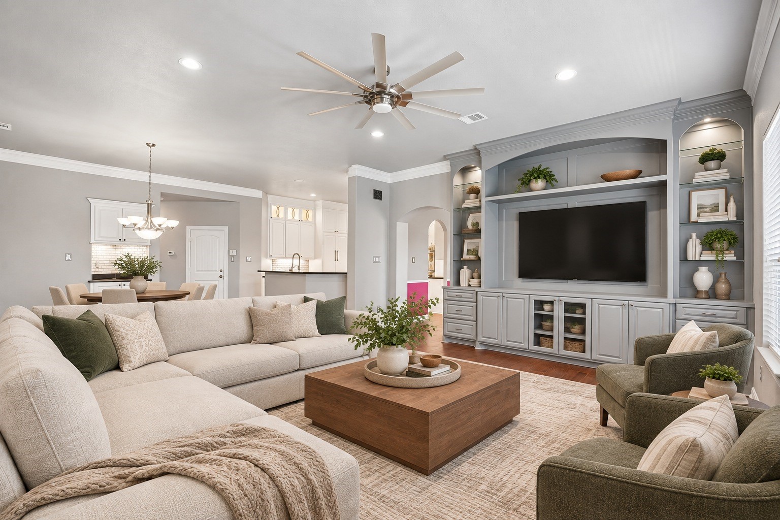 Virtually Staged. Living area-Furniture can be arranged several ways in here -have it face the beautiful built-ins or flip it toward the fireplace for a cozier feel or open it up and enjoy the best of both worlds.