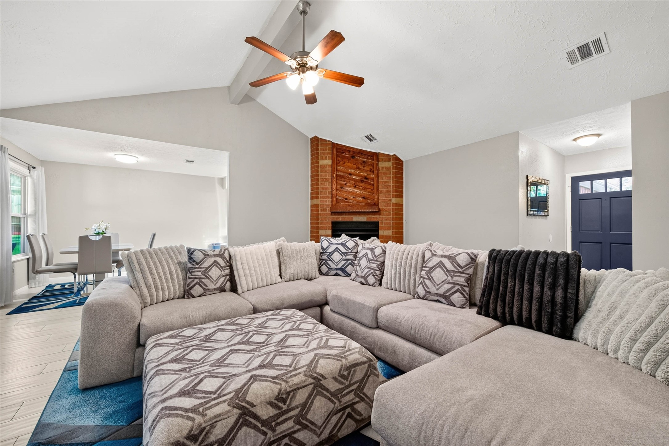 Spacious living room for the family with easy access to the dining room and the kitchen.