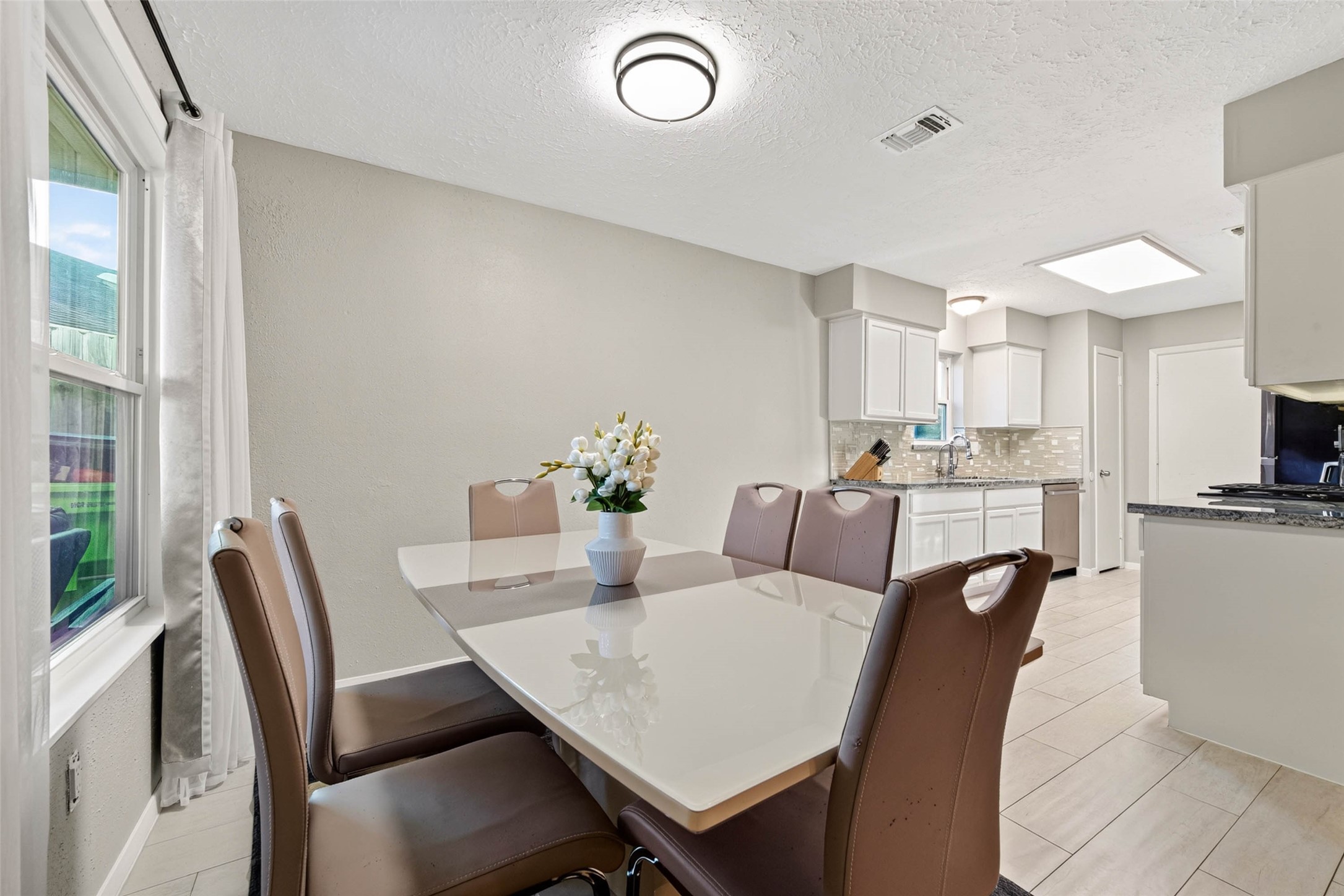 Dining room right next to the kitchen.