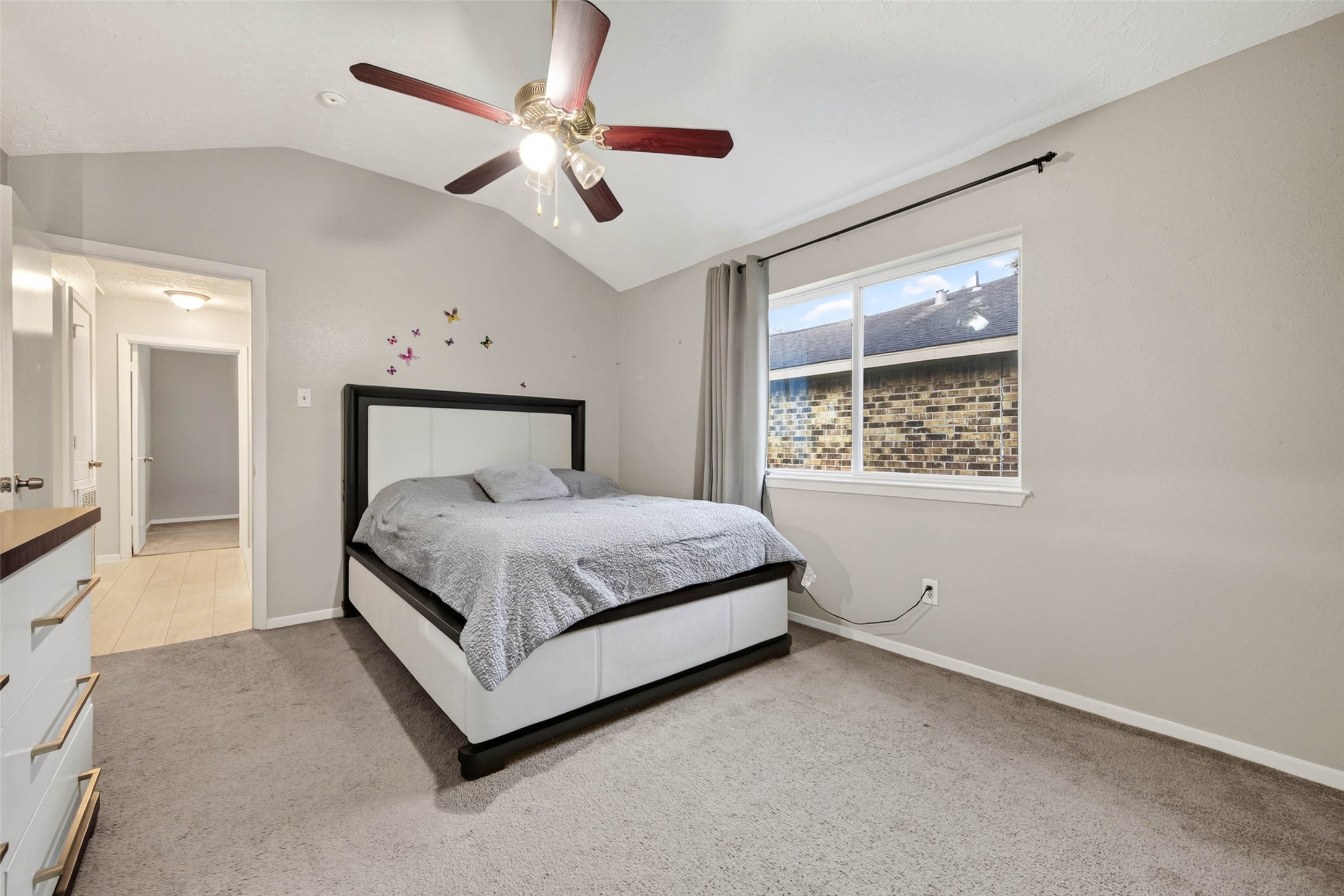 Another view of the primary bedroom