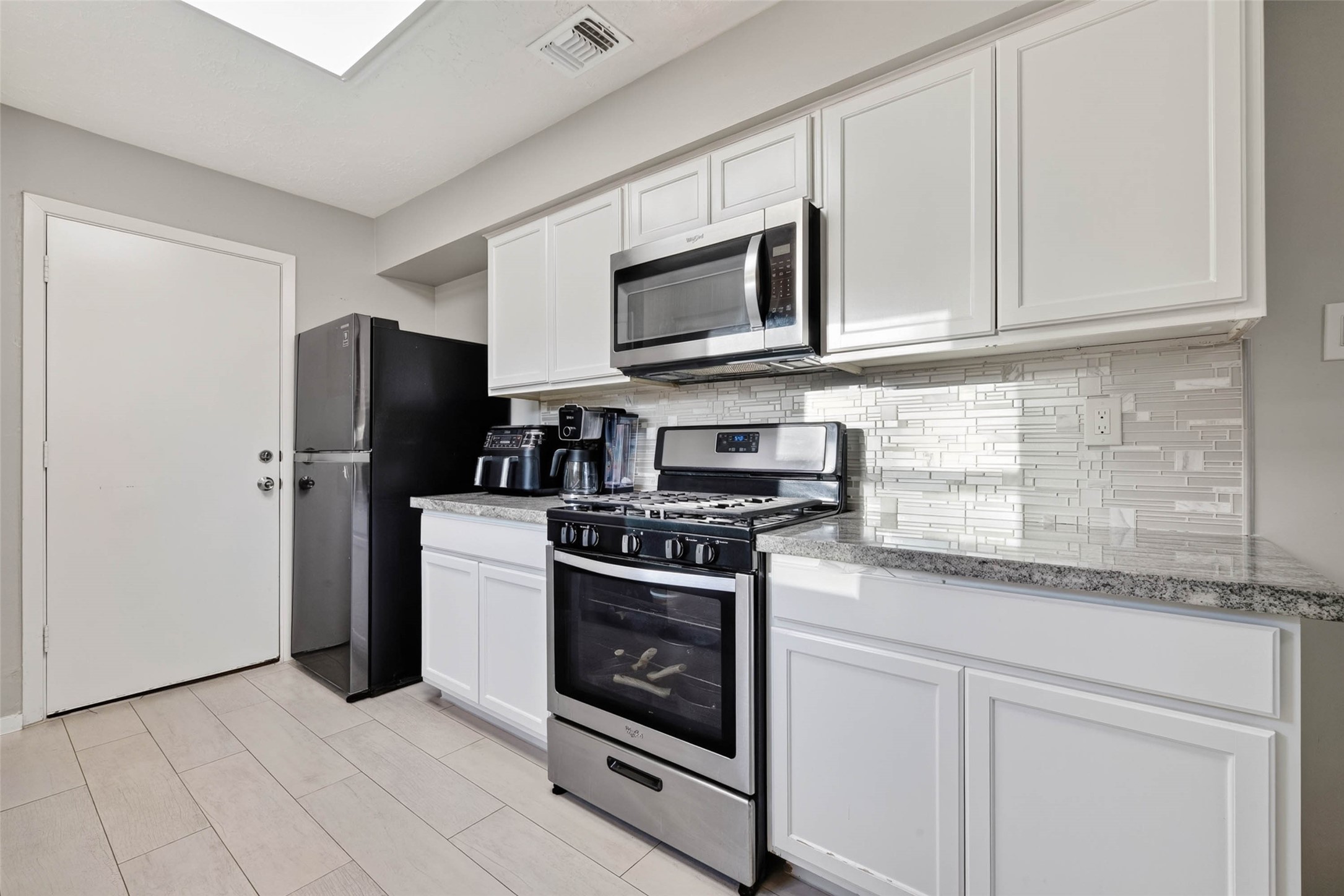 Another view of the kitchen.