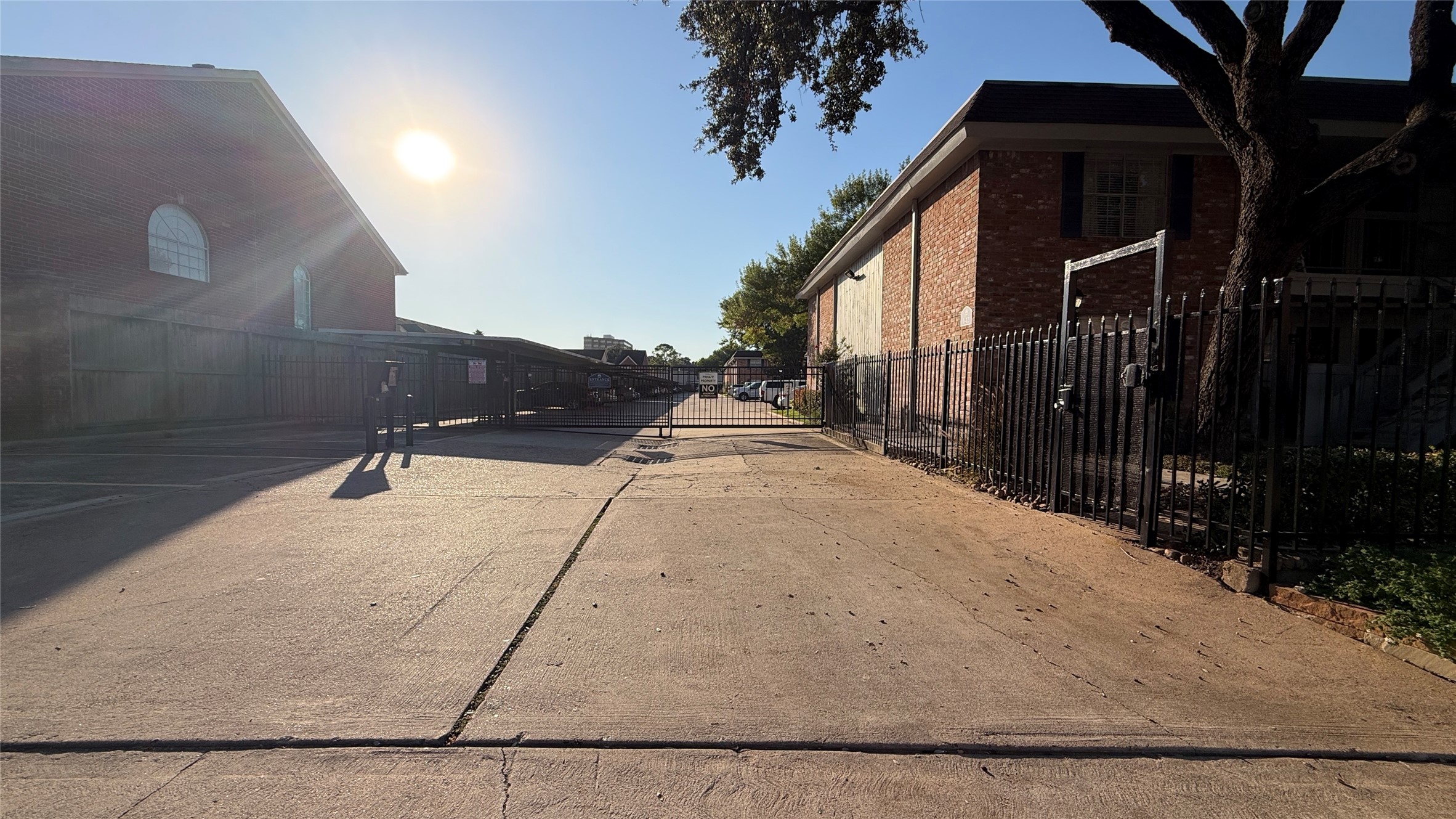 Controlled-access vehicle entrance provides an additional layer of convenience for residents.