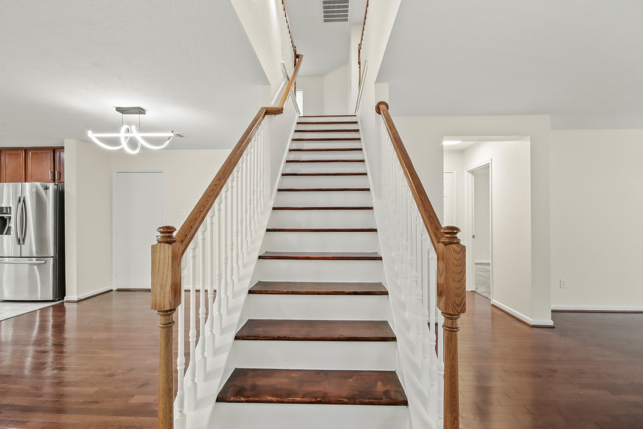 A well positioned staircase serves as a central feature, providing convenient access to the second-floor areas. A well positioned staircase serves as a central feature, providing convenient access to the second-floor areas.
