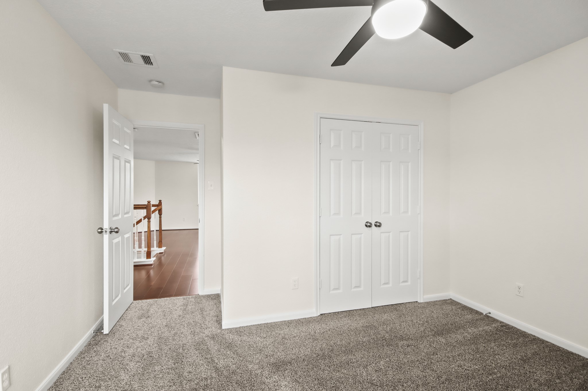 This bedroom has a built-in closet.