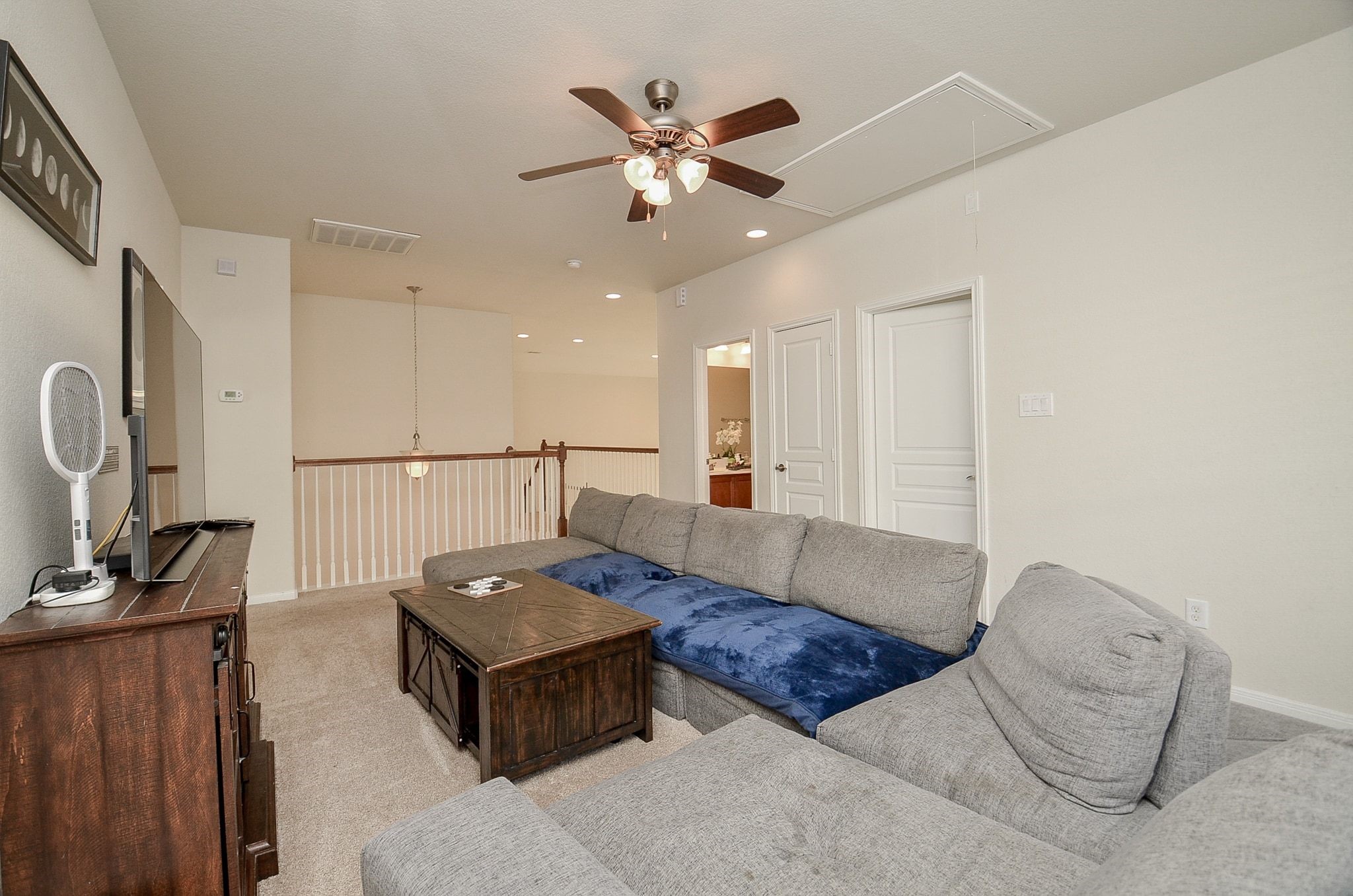 Additional view of the upstairs game room.