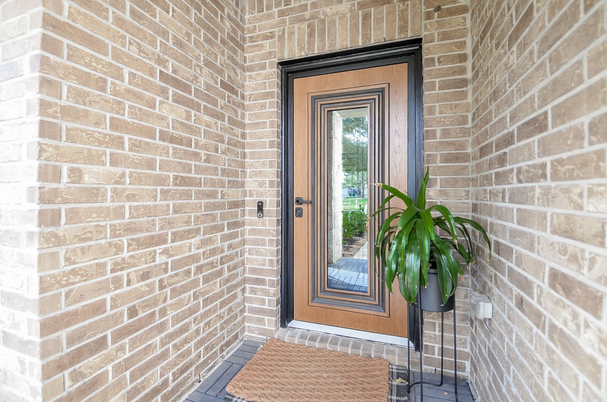 Inviting entryway featuring an elegant front door with decorative glass. Inviting entryway featuring an elegant front door with decorative glass.