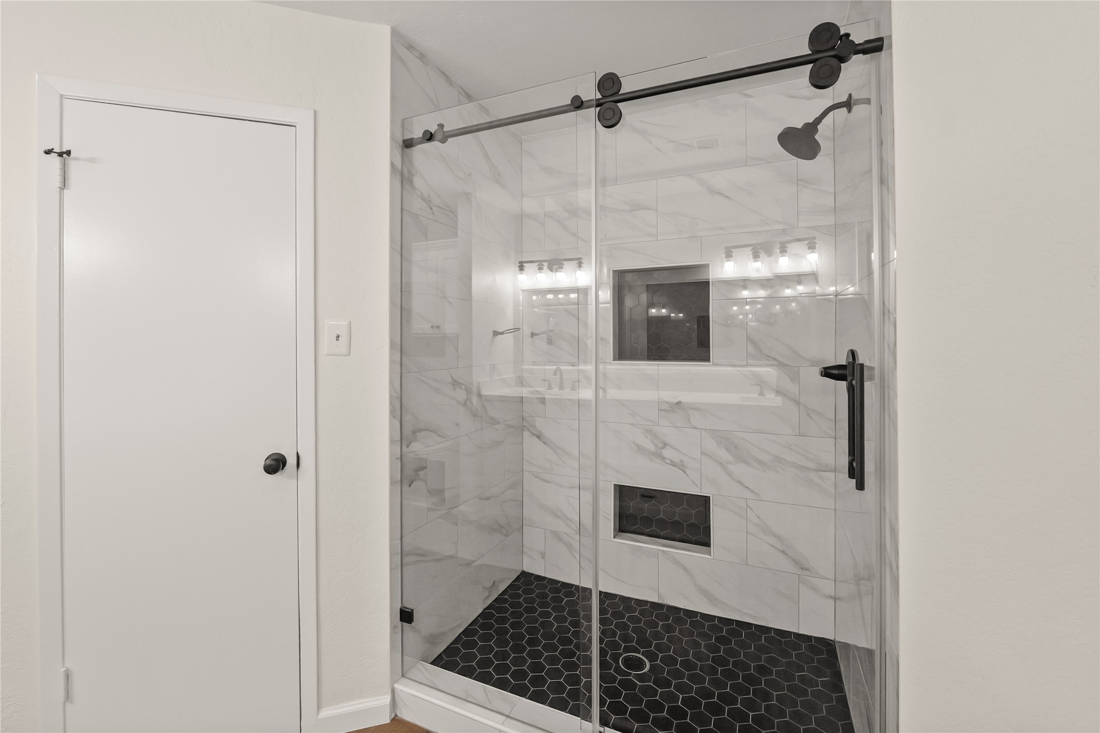 Stunning shower featuring contemporary tile design