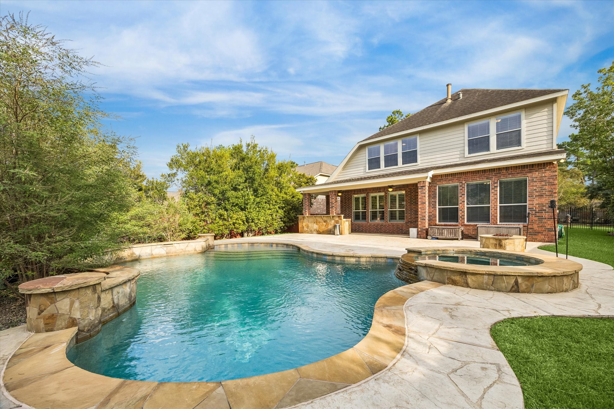 Yard and pool service covered by landlord. Full outdoor kitchen includes grill and mini fridge.