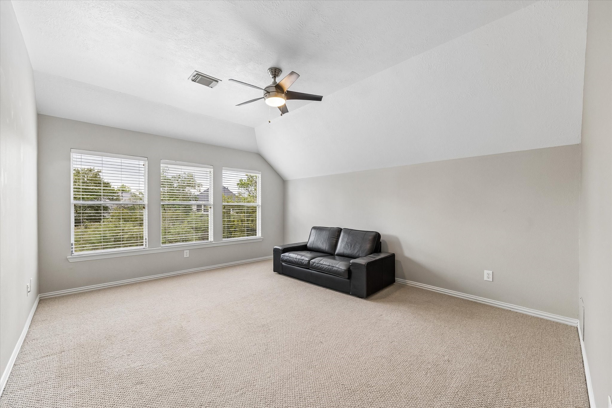 Game room upstairs has an unobstructed view of the pool.