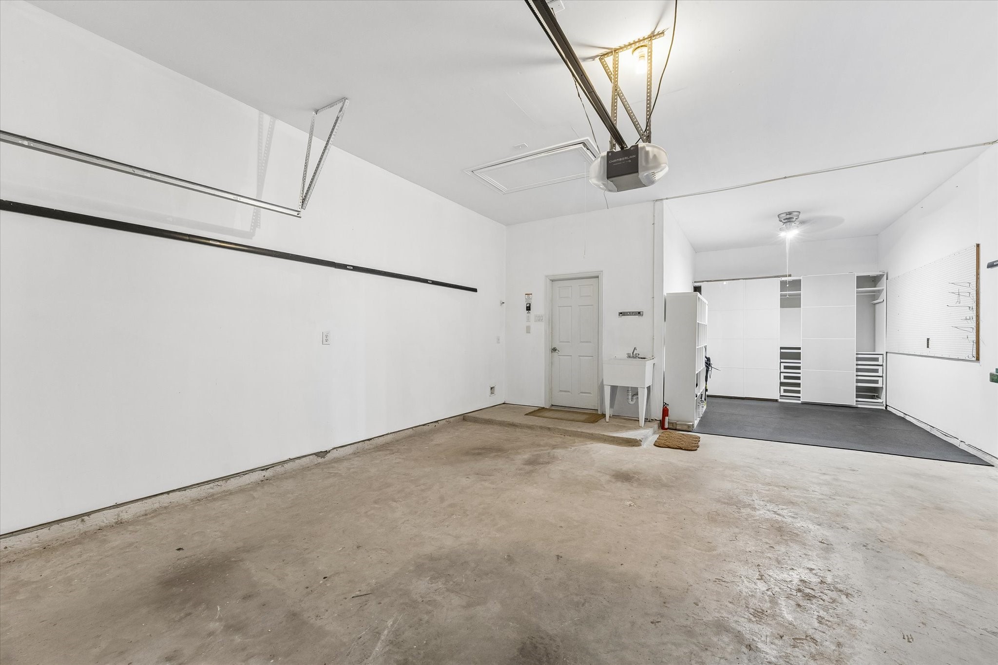 3 car tandem garage with shelving included