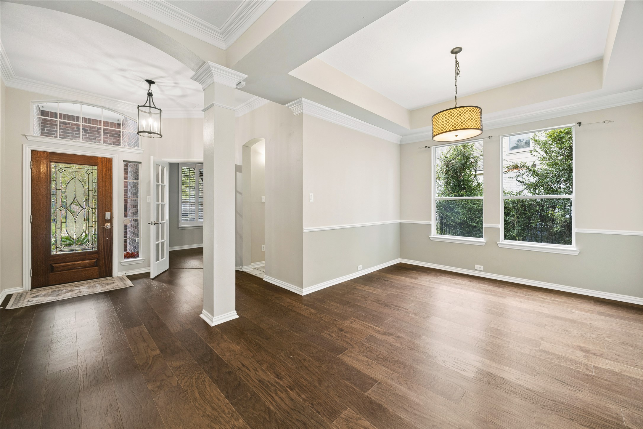 Lots of sunlight flooding the home entrance. French doors open up to the home office/study Lots of sunlight flooding the home entrance. French doors open up to the home office/study