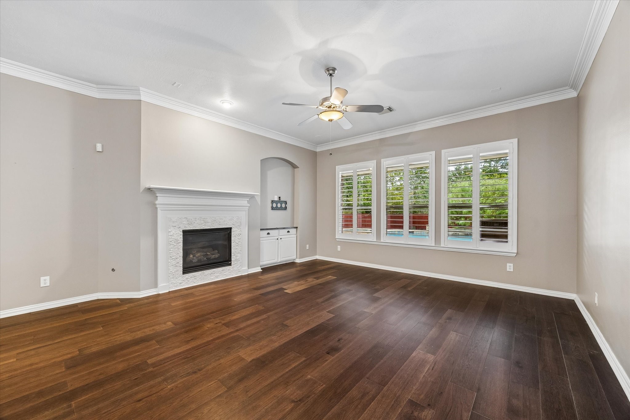 Cozy evenings spent entertaining in your spacious living room overlooking the pool