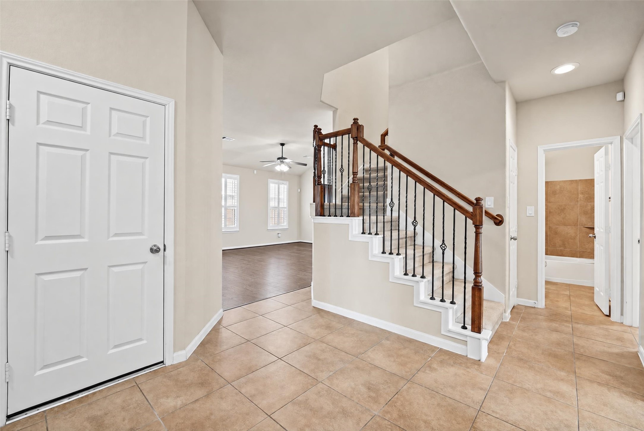 Entry way is large and leads to all secondary bedrooms on the right, garage on the left and the large living and kitchen area straight ahead!