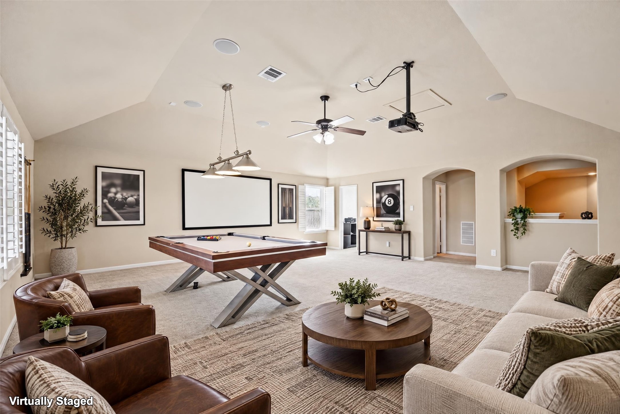 Virtually staged gameroom to show ideas of furniture placement.  So many possibilities!