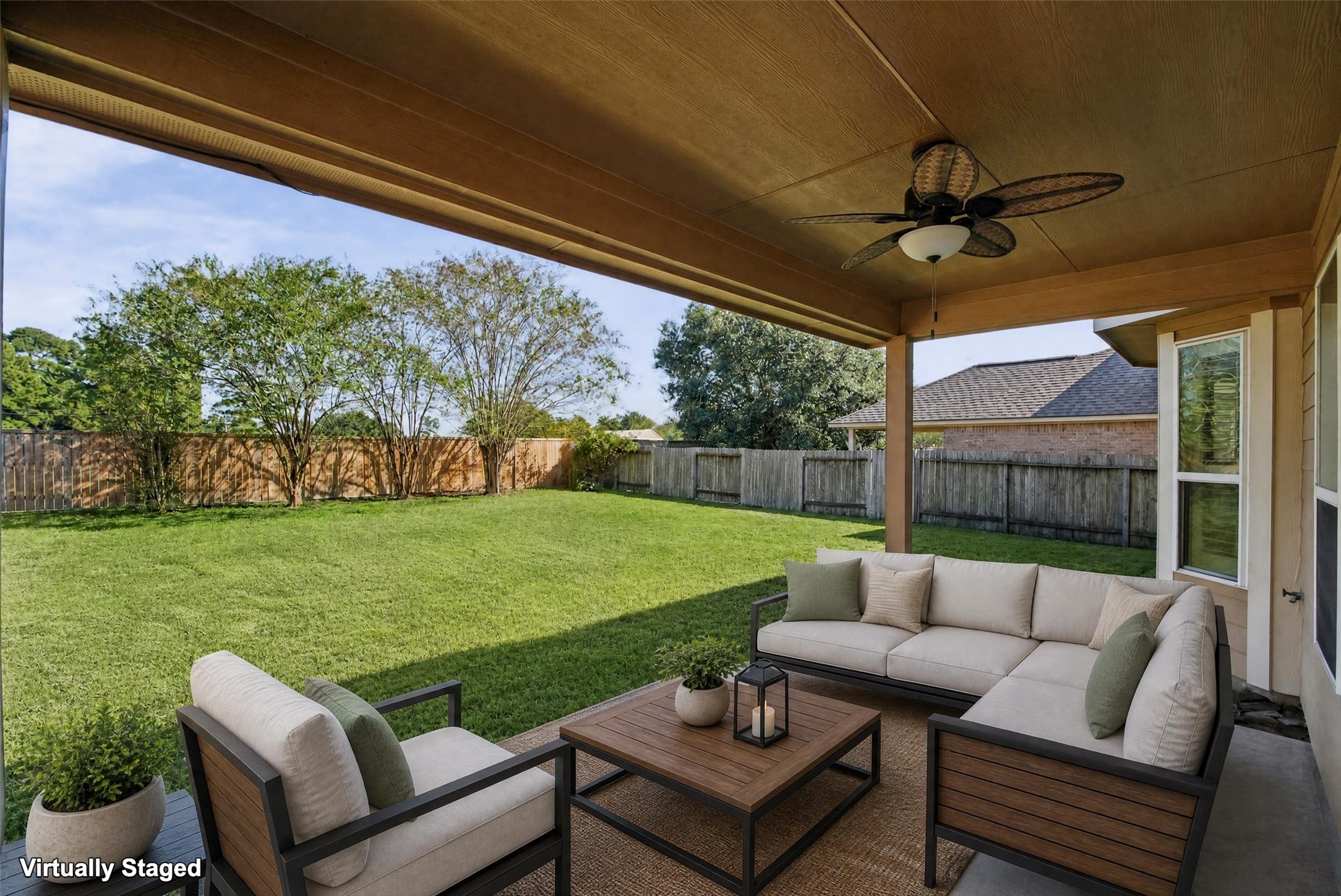 Virtually staged outdoor living space.
