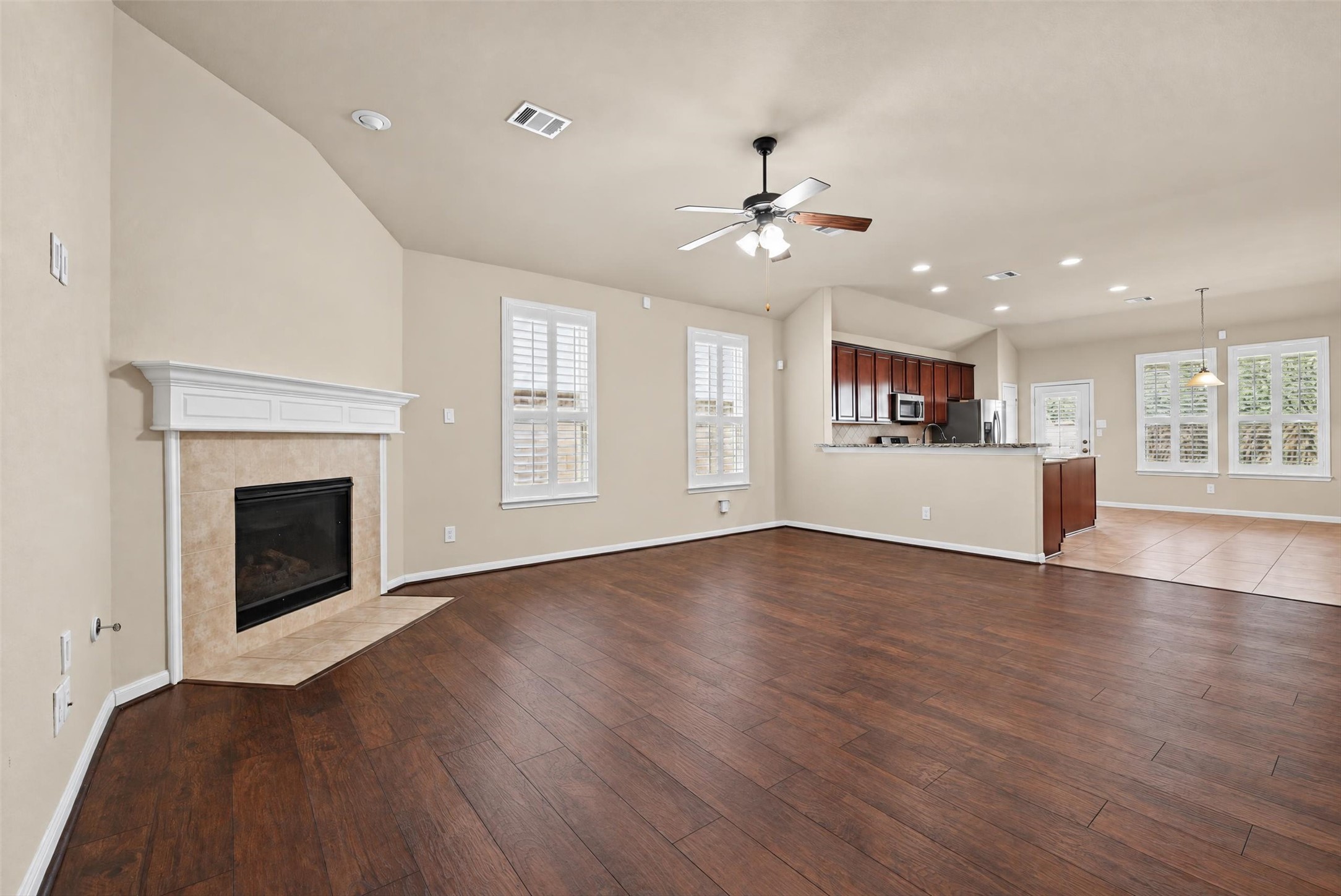 Large den with beautiful, engineered wood floors!
