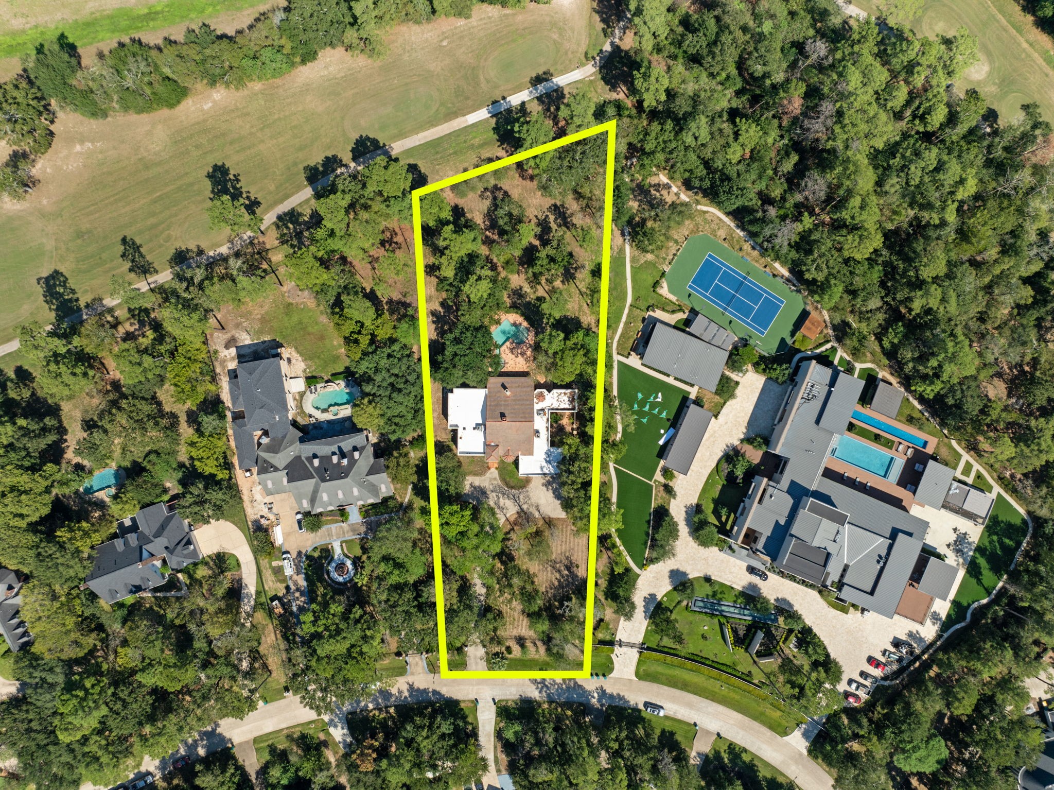 Excellent opportunity to renovate or build your dream home on a 1.4 acre lot on the Oaks Golf Course in prestigious Grogan's Point!