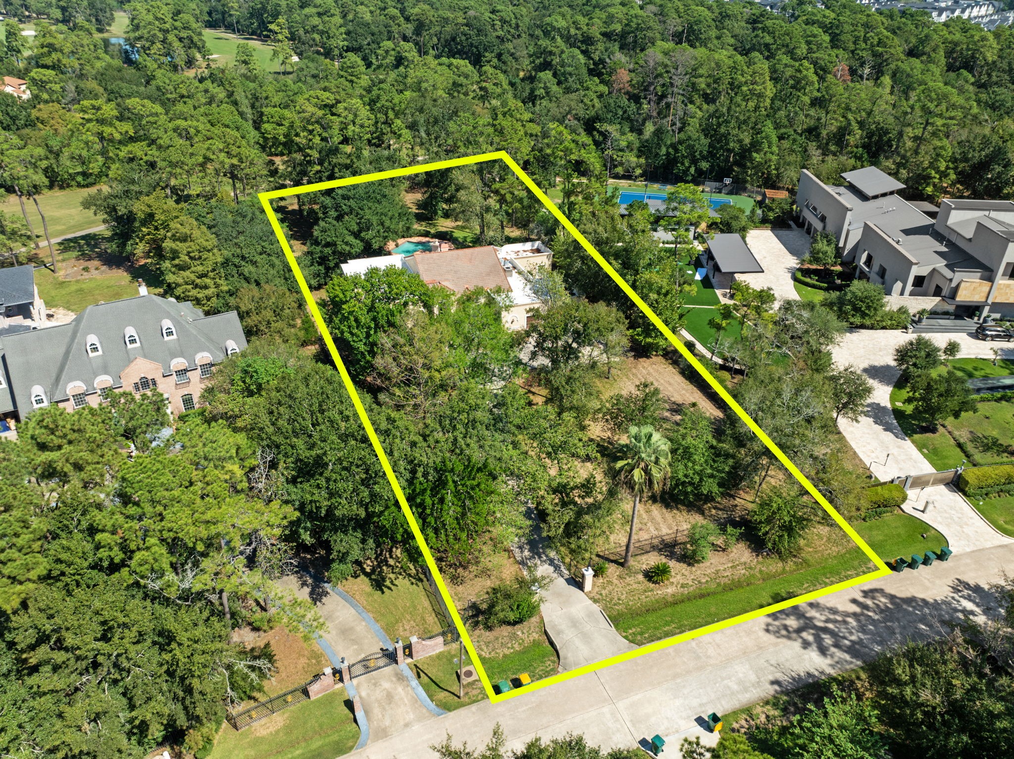 The property currently features an existing home and pool that are considered non-remodelable, providing a blank canvas to build your dream home of up to 10,000 square feet. Potential for additional square footage is available through a variance.